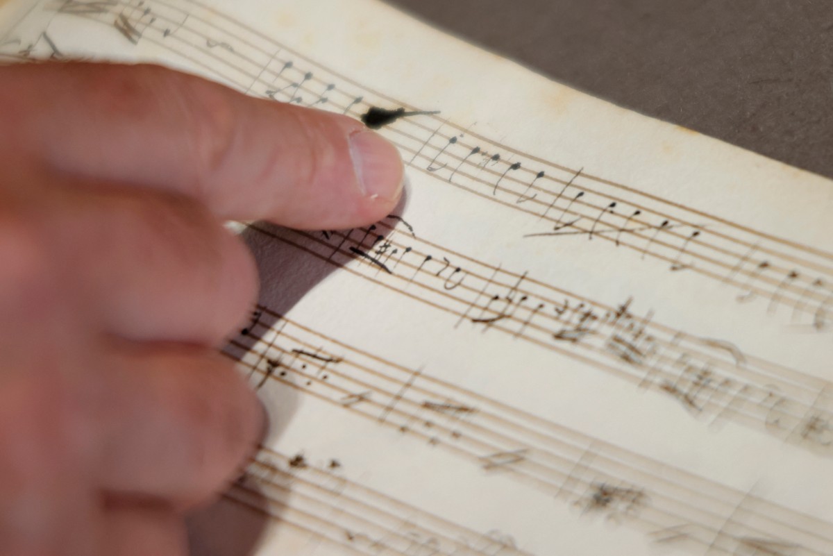 This photograph taken on June 15, 2026, shows an original fragment of Wolfgang Amadeus Mozart’s music handwritten notebook at Richelieu Library (Bibliotheque Nationale de France-National Library of France-BnF) in Paris.