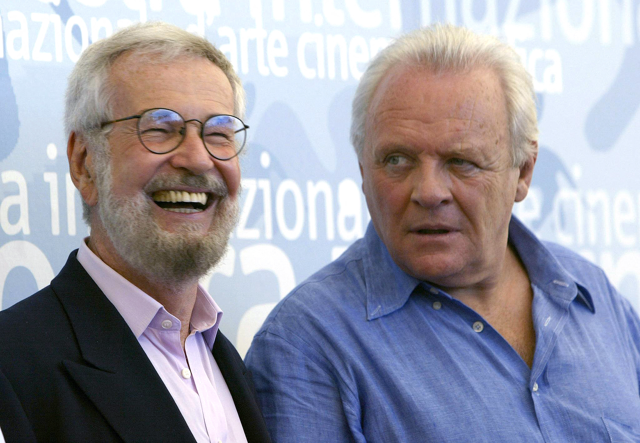 (FILES) English actor Anthony Hopkins (R) and US director Robert Benton attend a photo call at Venice Lido August 30, 2003. Benton and his starring actors present his film " The Human Stain" shown out of competition at the Venice International Film festival.