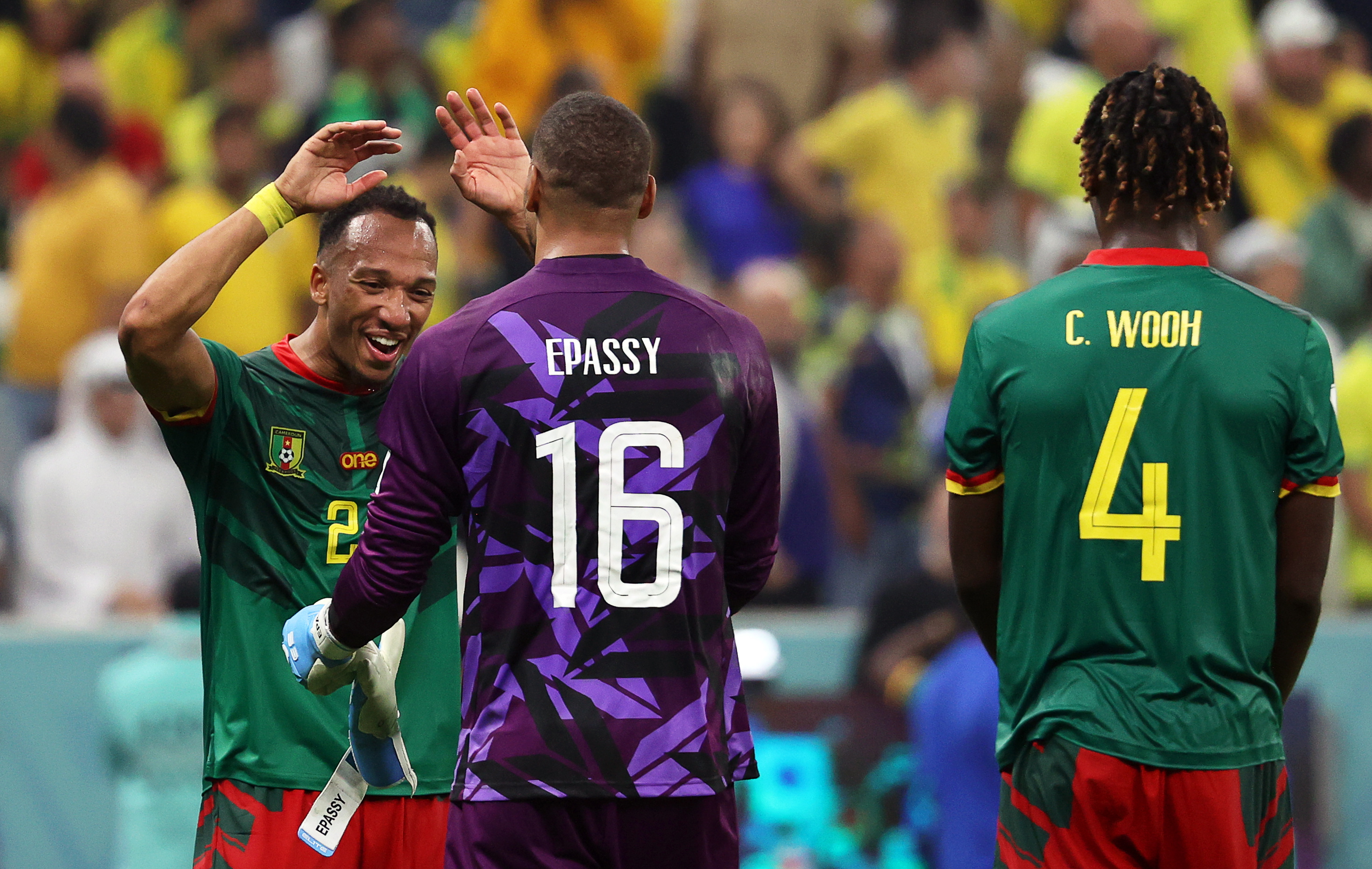 Lusail (Qatar), 02/12/2022.- Cameroonian players Enzo Ebosse (L) and goalkeeper Devis Epassy (C) react after winning the FIFA World Cup 2022 group G soccer match between Cameroon and Brazil at Lusail Stadium in Lusail, Qatar, 02 December 2022. (Mundial de Fútbol, Brasil, Camerún, Estados Unidos, Catar) EFE/EPA/Abedin Taherkenareh