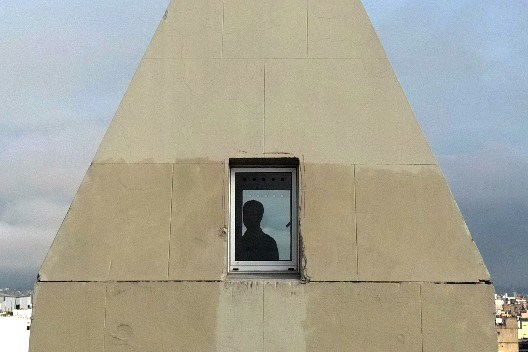 Aerial view showing a man looking down from the Obelisk observation deck in Buenos Aires on May 8, 2025.