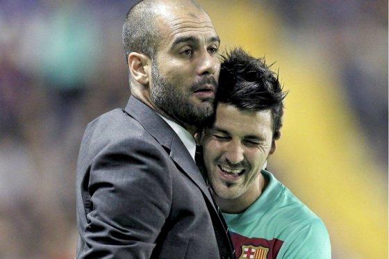 Guardiola y Villa coincidieron en el Barcelona entre el 2010 y 2012. / EFE