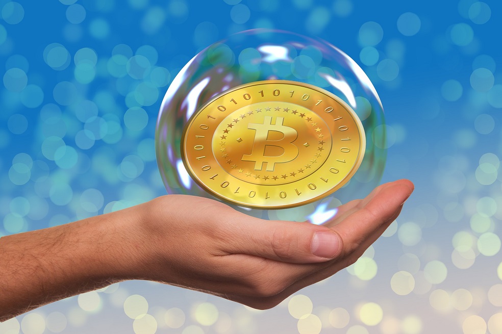 Bitcoin llega a más de US$11.000 para luego caer US$9.643