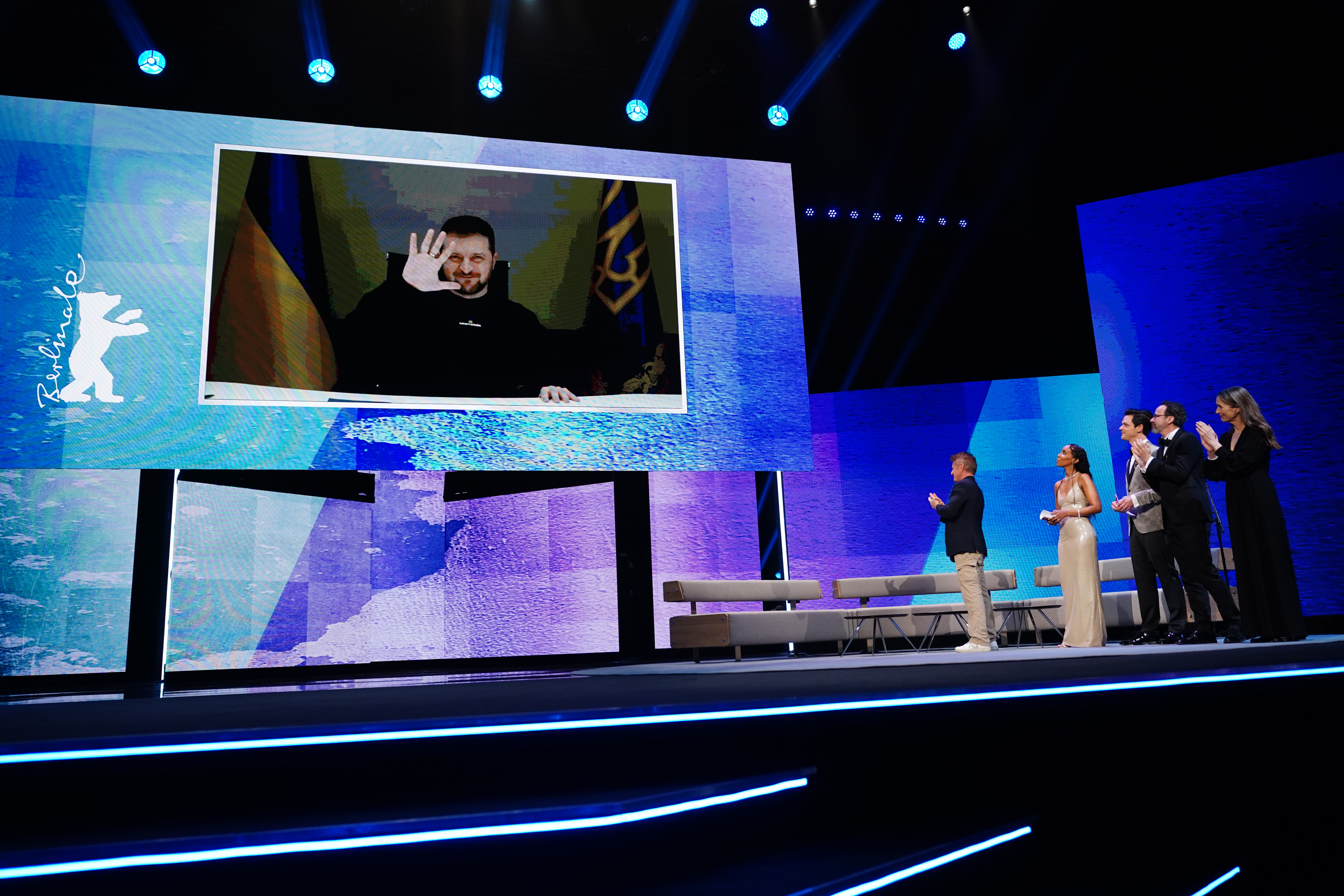 Berlin (Germany), 16/02/2023.- Ukraine's President Volodymyr Zelensky appears on screen at the Opening Ceremony of the 73rd Berlin International Film Festival 'Berlinale' in Berlin, Germany, 16 February 2023. The in-person event runs from 16 to 26 February 2023. (Cine, Alemania, Ucrania) EFE/EPA/CLEMENS BILAN