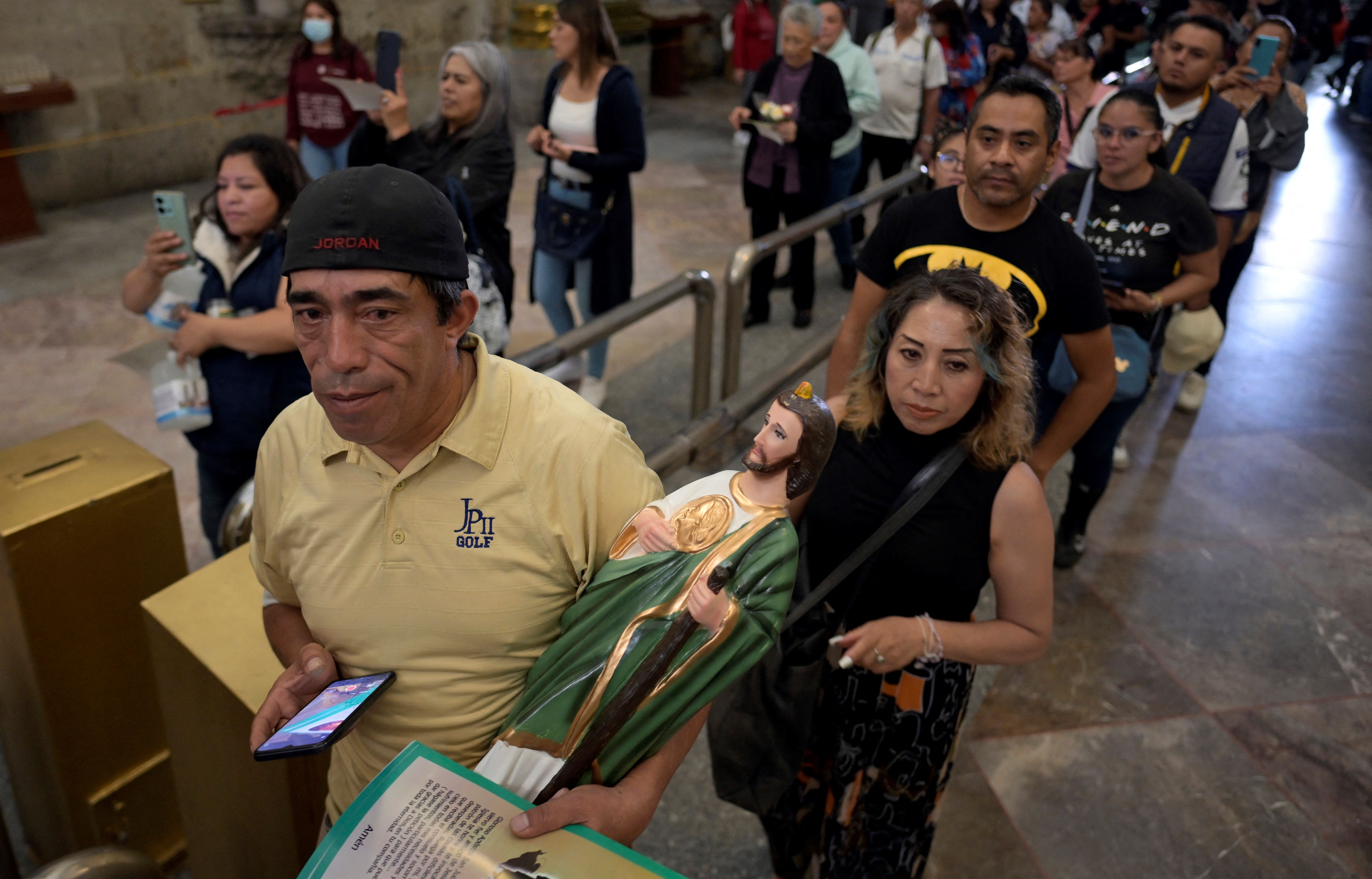 Dozens of faithful attend the Temple of San Hipólito to venerate the relic of Saint Jude Thaddeus in Mexico City on August 1, 2024.