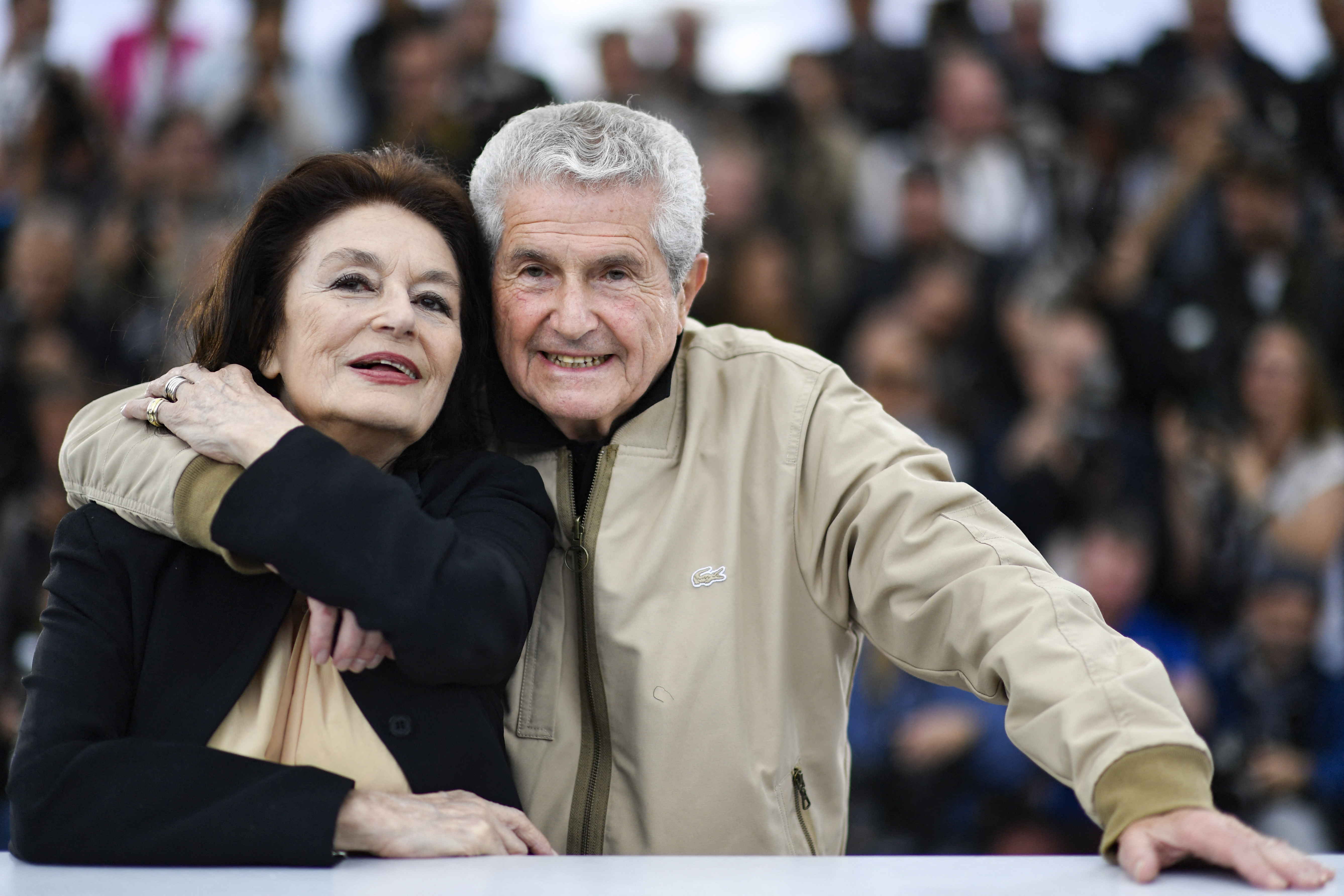 (FILES) French actress Anouk Aimee (L) and French director Claude Lelouch pose during a photocall for the film "The Best Years of a Life (Les Plus Belles Annees D'Une Vie)" at the 72nd edition of the Cannes Film Festival in Cannes, southern France, on May 19, 2019.