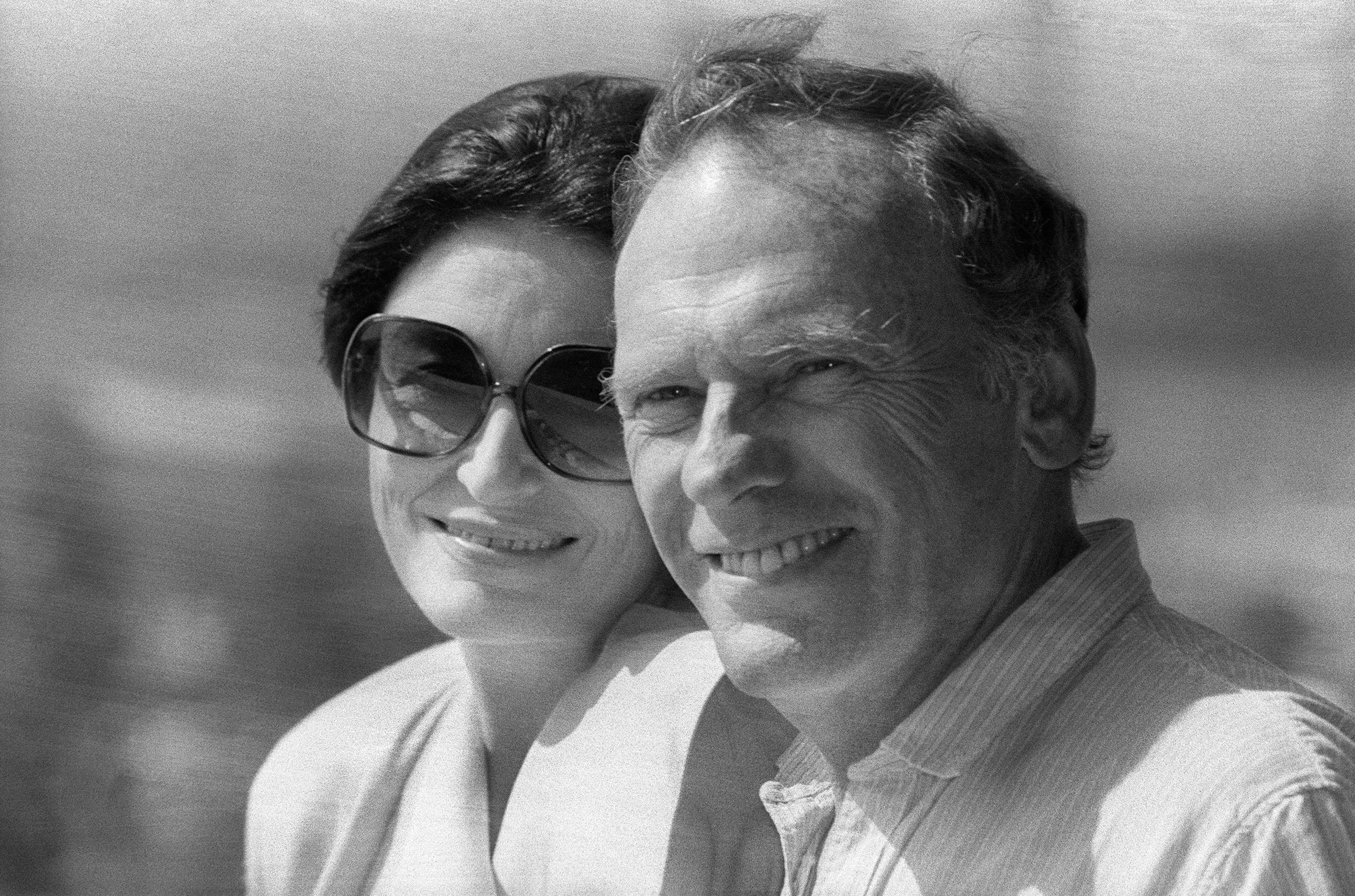(FILES) French actress Anouk Aimee (L) and actor Jean-Louis Trintignant smile to the photographers during the 39th Cannes International Film Festival on May 1986, twenty years after "Une homme et une femme" directed by Claude Lelouch.