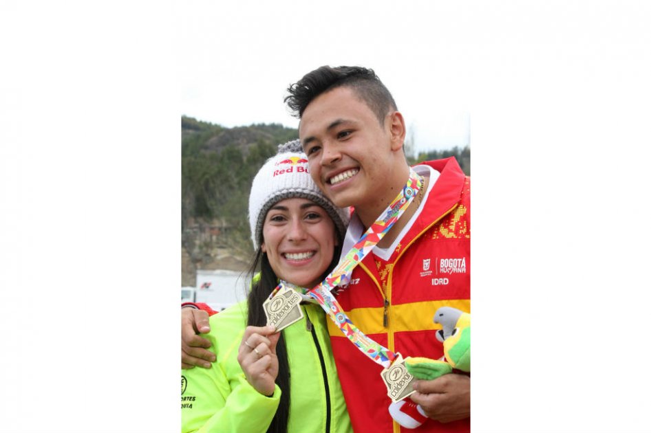 Mariana Pajón (Antioquia) y Miguel Alejandro Calixto (Bogotá) ganadores de la CRI en BMX. Foto: AFP