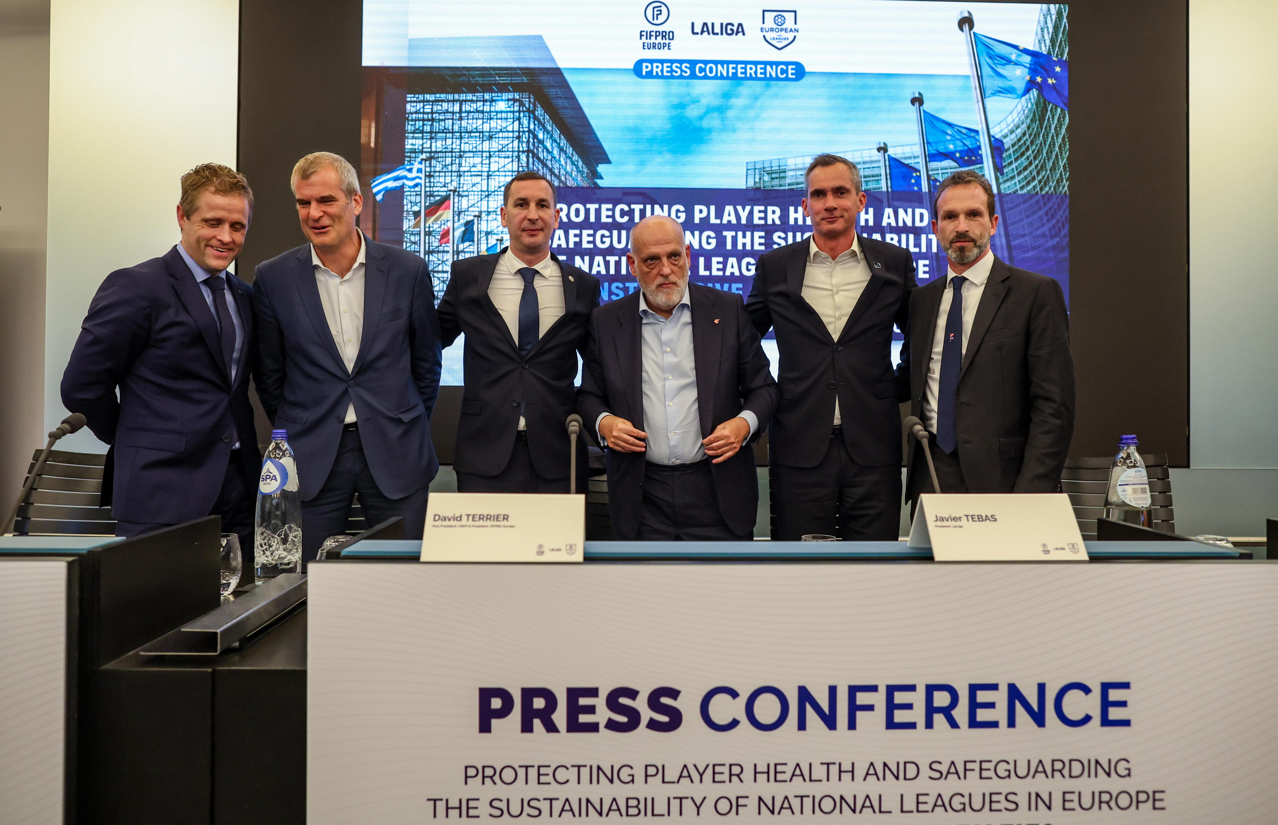 Brussels (Belgium), 14/10/2024.- From L - Norwegian player union (NISO) executive president Kristoffer Vatshaug, Mathieu Moreuil, director of International Football Relations & EU Affairs at the Premier League, FIFPRO Europe president David Terrier, Spanish LaLiga president Javier Tebas, Belgian Pro League CEO Lorin Parys, and Umberto Calcagno, president of the Italian Footballers Association, at the end of a press conference in Brussels, Belgium, 14 October 2024. European Leagues, FIFPRO Europe and LaLiga on 14 October 2024 filed a formal complaint to the European Commission against FIFA on competition law grounds. (Bélgica, Bruselas) EFE/EPA/OLIVIER HOSLET