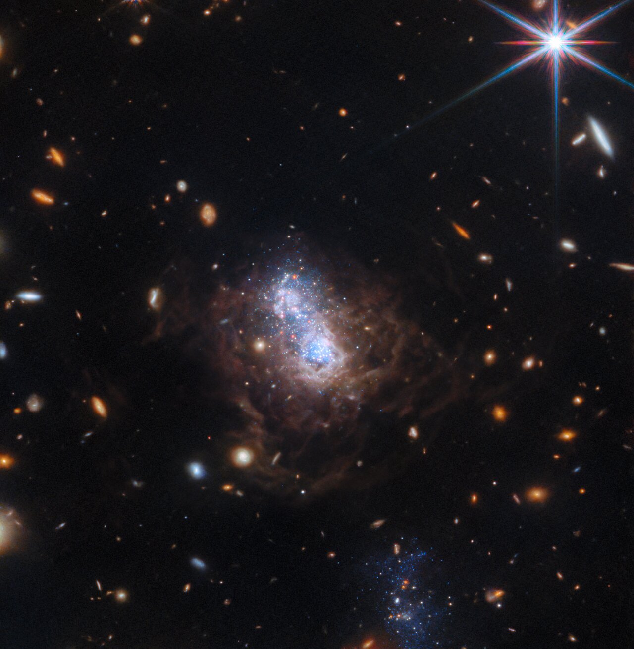 Telescopio James Webb capta un estallido de estrellas en una galaxia antigua