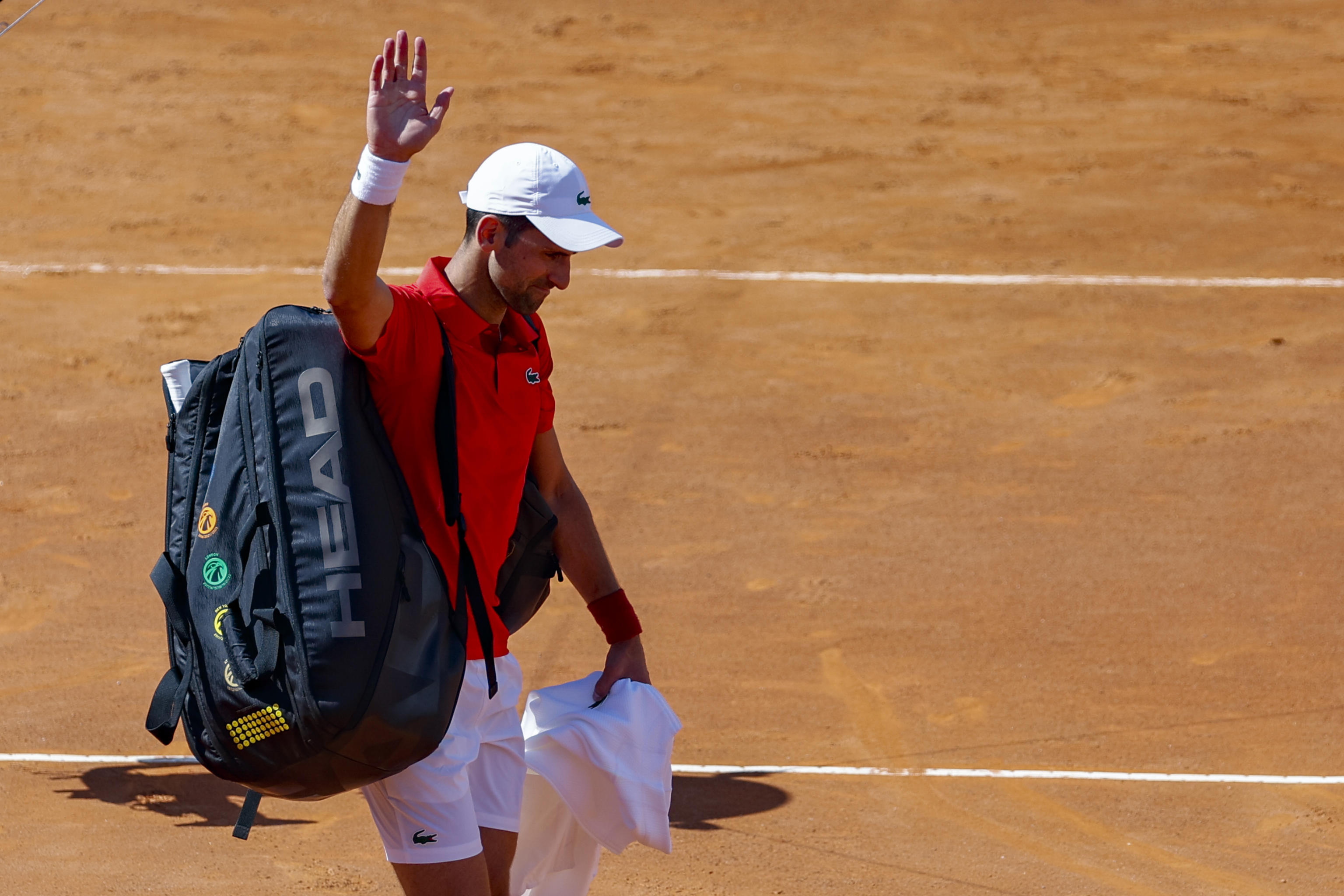 Rome (Italy), 12/05/2024.- Novak Djokovic of Serbia salutes the audience after losing against Alejandro Tabilo of Chile (not pictured) during their men's singles match at the Italian Open tennis tournament in Rome, Italy, 12 May 2024. (Tenis, Italia, Roma) EFE/EPA/FABIO FRUSTACI