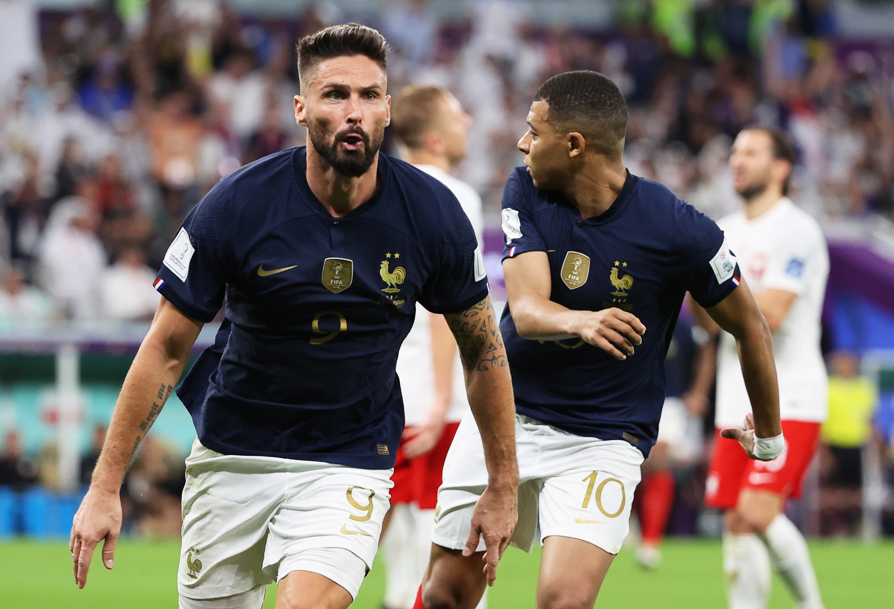 Doha (Qatar), 04/12/2022.- Olivier Giroud (L) of France celebrates with teammate Kylian Mbappe (R) after scoring the 1-0 lead during the FIFA World Cup 2022 round of 16 soccer match between France and Poland at Al Thumama Stadium in Doha, Qatar, 04 December 2022. (Mundial de Fútbol, Francia, Polonia, Catar) EFE/EPA/Ali Haider