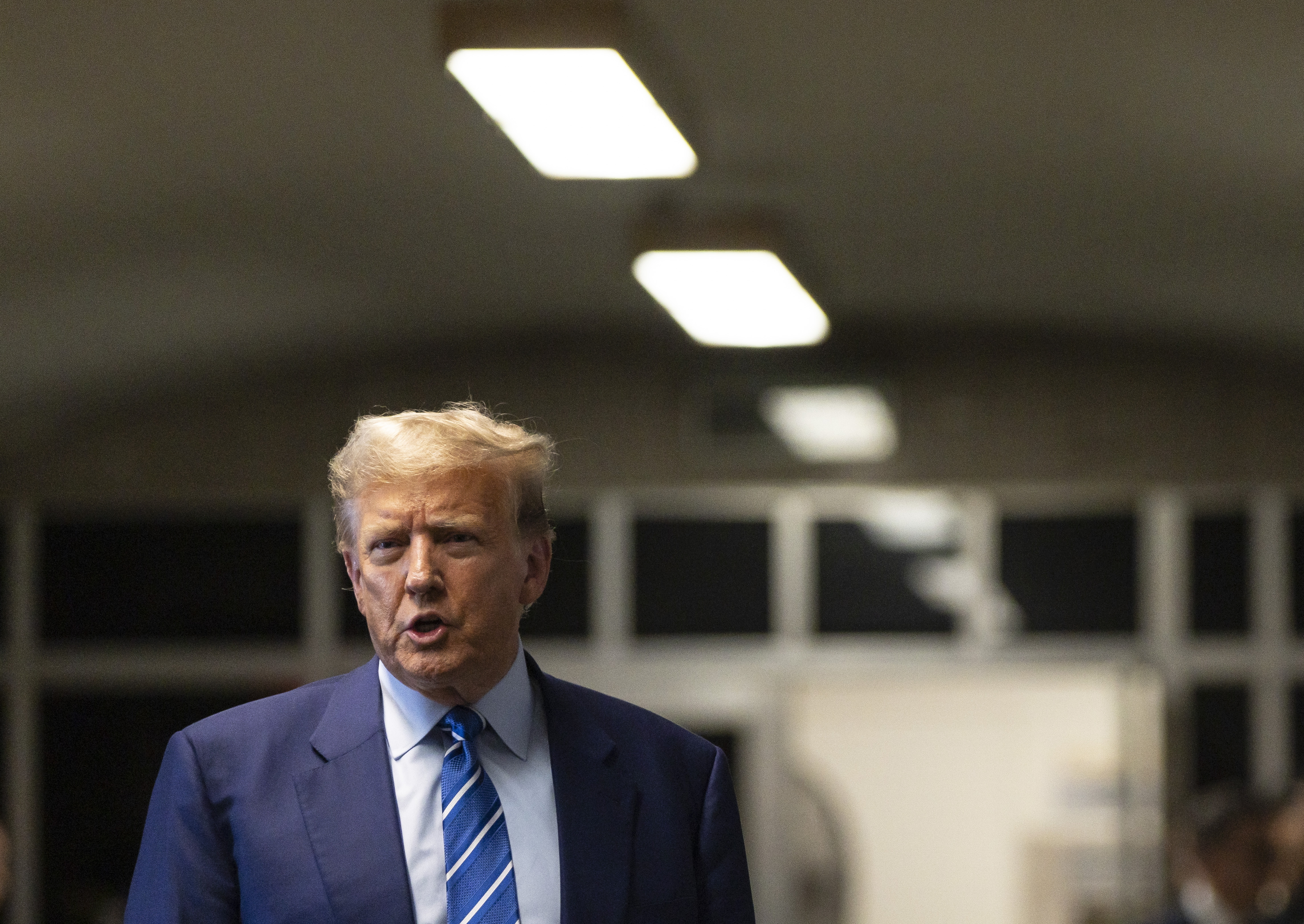 New York (United States), 16/04/2024.- Former U.S. President Donald Trump talks to reporters at the conclusion of the second day of jury selection for his criminal trial at New York State Supreme Court in New York, New York, USA, 16 April 2024. Trump is facing 34 felony counts of falsifying business records related to payments made to adult film star Stormy Daniels during his 2016 presidential campaign. (tormenta, Nueva York) EFE/EPA/JUSTIN LANE
