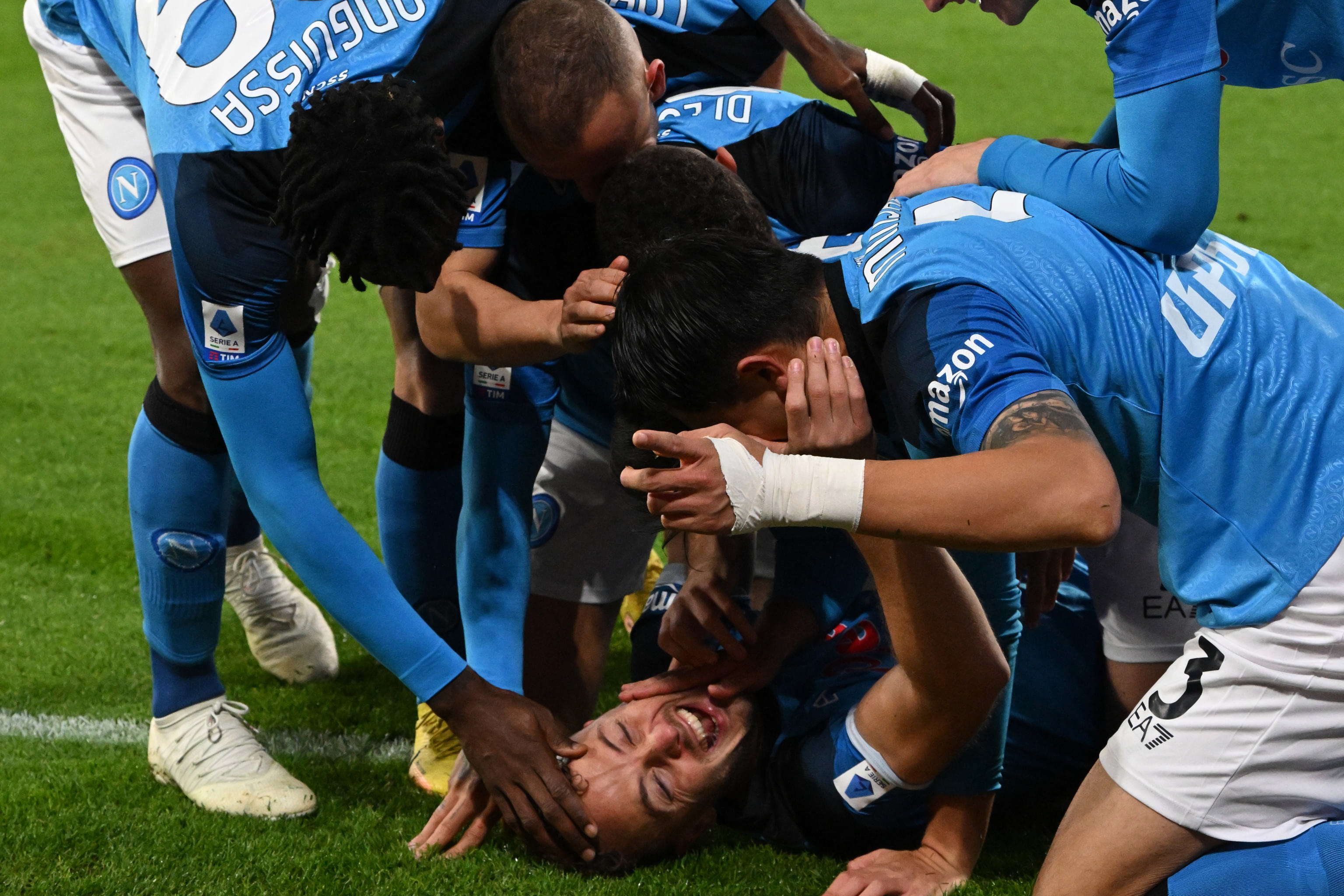 Naples (Italy), 13/01/2023.- Napoli's defender Amir Rrahmani (down) celebrates with teammates after scoring the 3-1 lead during the Italian Serie A soccer match SSC Napoli vs Juventus FC in Naples, Italy, 13 January 2023. (Italia, Nápoles) EFE/EPA/CIRO FUSCO