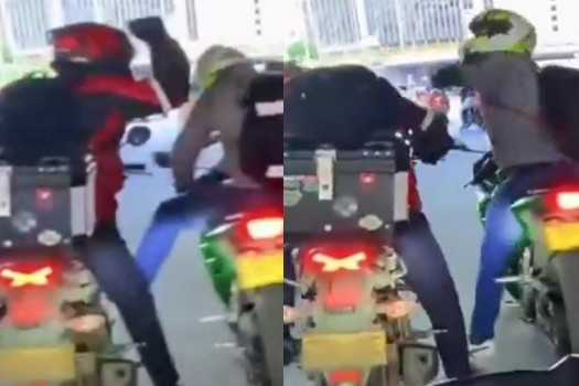 Motociclistas se van a los puños en plena vía de Bogotá: ni se bajaron de la moto