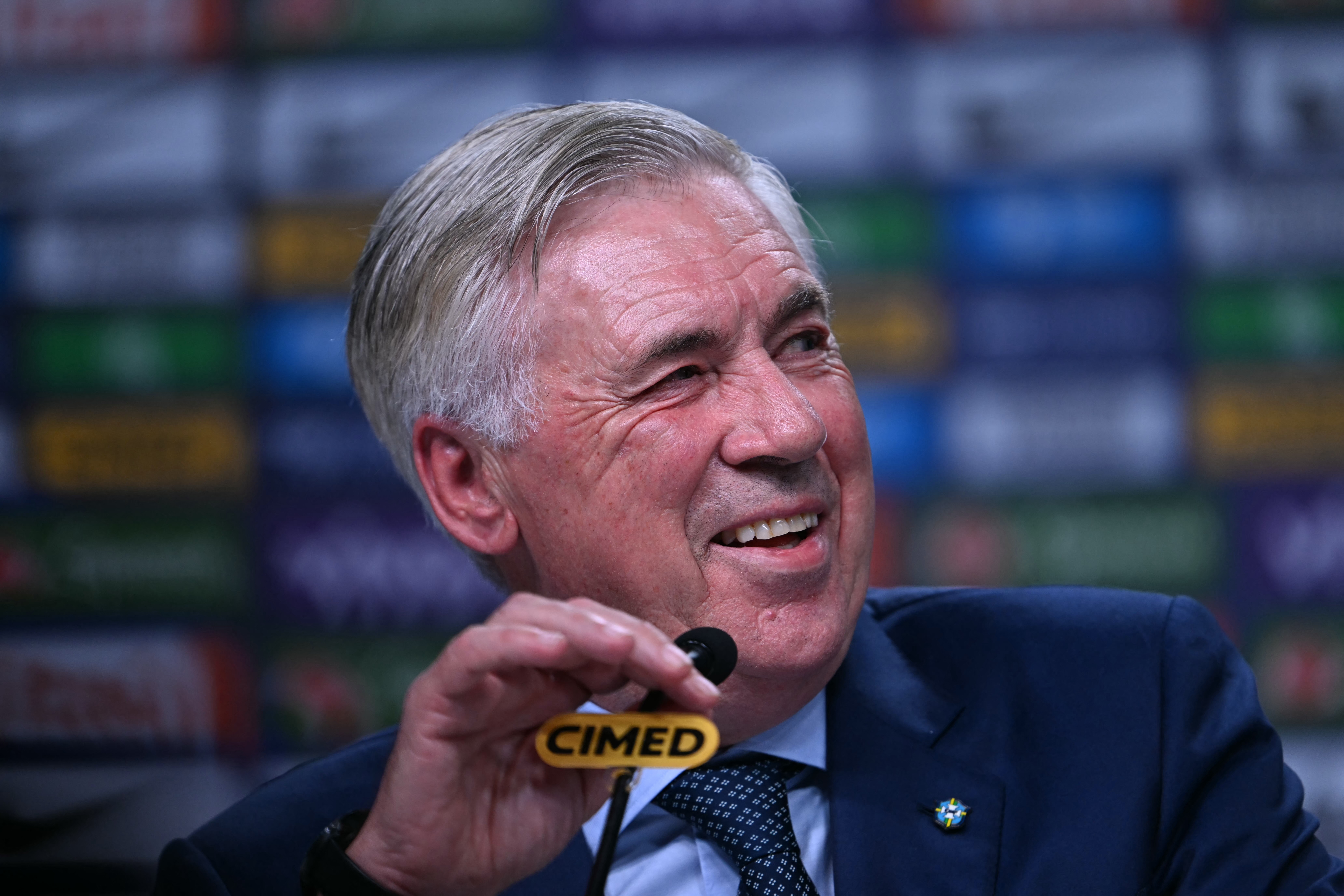 Brazil's football team head coach, Italian Carlo Ancelotti, gestures during a press conference at the Brazilian Football Confederation (CBF) headquarters in Barra da Tijuca neighbourhood, Rio de Janeiro, Brazil, on August 25, 2025. (Photo by MAURO PIMENTEL / AFP)