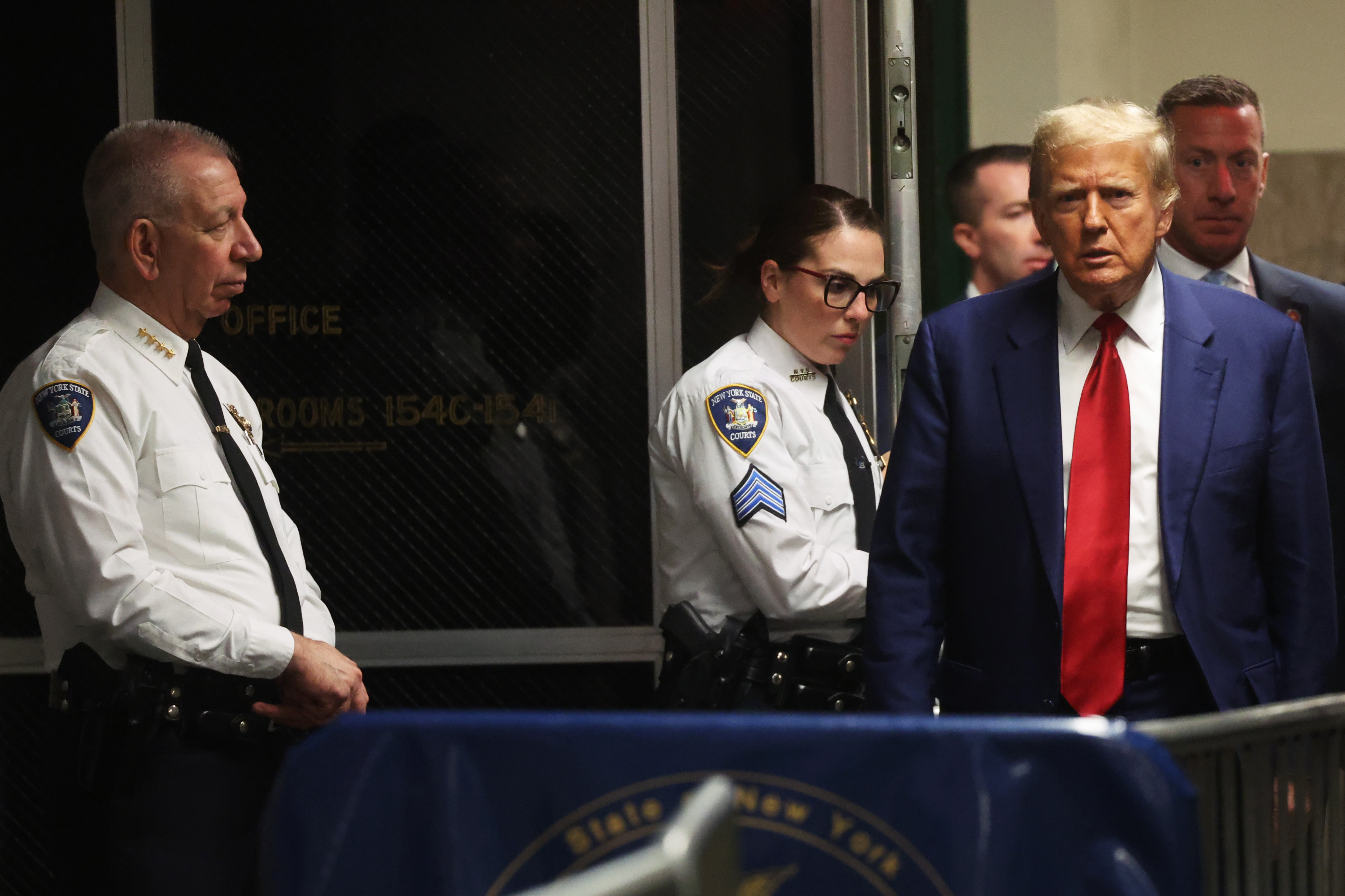 New York (United States), 25/03/2024.- Former US president Donald Trump (R) returns to court from a recess during a pre-trial hearing in a hush money case in criminal court in New York City, New York, USA, 25 March 2024. Trump was charged with 34 counts of falsifying business records last year, which prosecutors say was an effort to hide a potential sex scandal, both before and after the 2016 election. Judge Juan Merchan is expected to set a new start date for the trial after it was delayed following the disclosure of new documents in the case. (Nueva York) EFE/EPA/SPENCER PLATT / POOL