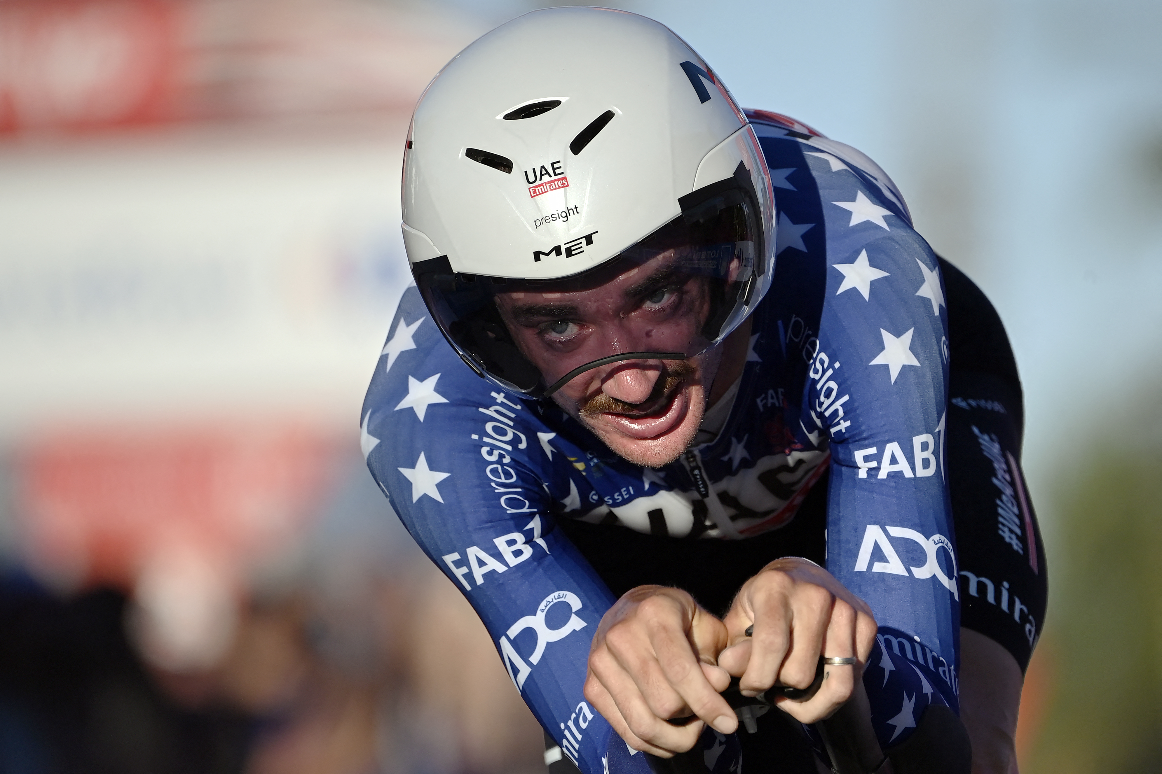 Team UAE's Brandon McNulty competes in the stage 1 of La Vuelta a Espana cycling tour, a 12 km time-trial race from Lisbon to Oeiras, on August 17, 2024. (Photo by MIGUEL RIOPA / AFP)
