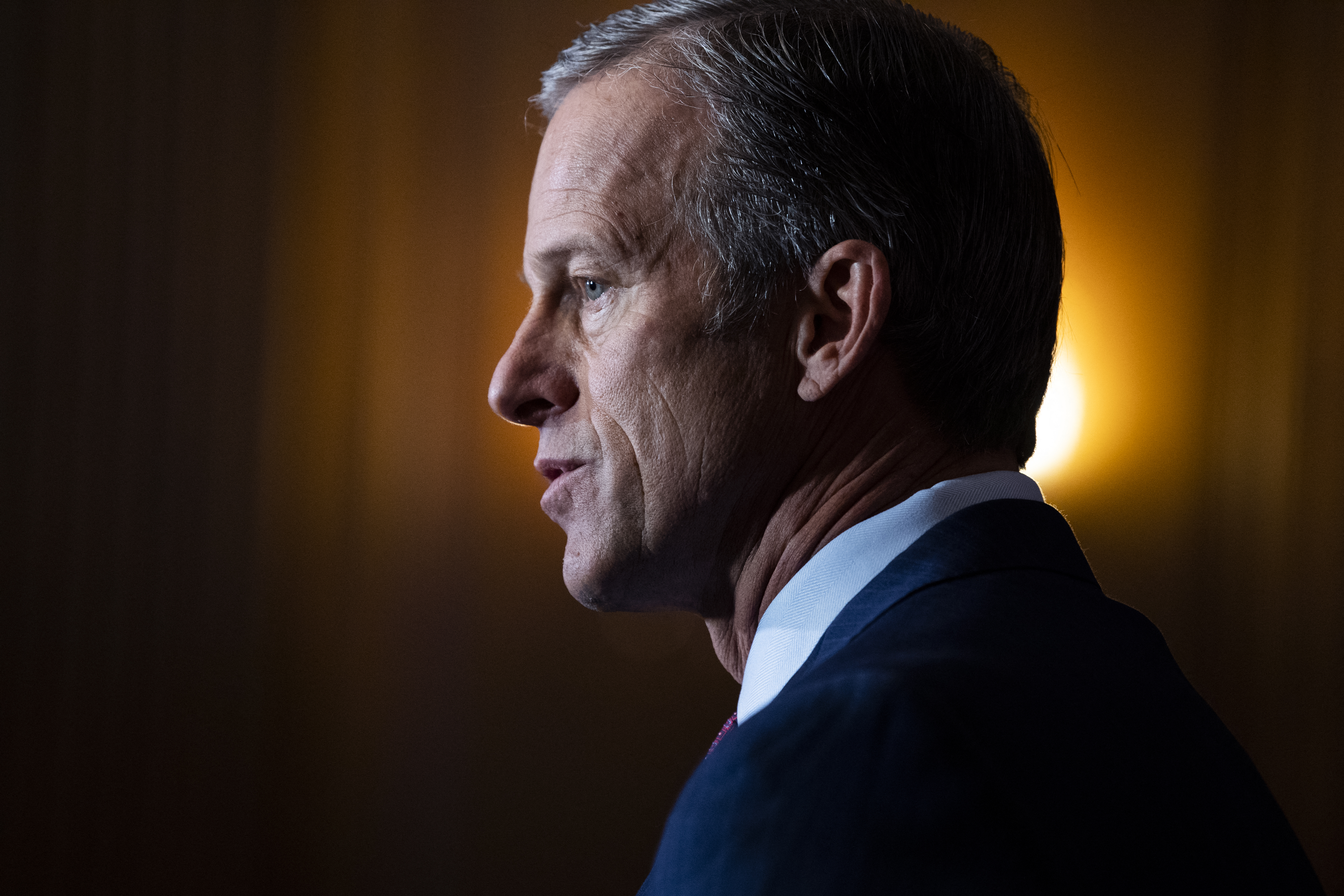 (FILES) US Senator John Thune (R-SD), speaks to reporters as Senate Republican leaders hold a news conference after the Senate Republican Policy luncheon on Capitol Hill in Washington, DC on December 1, 2020.