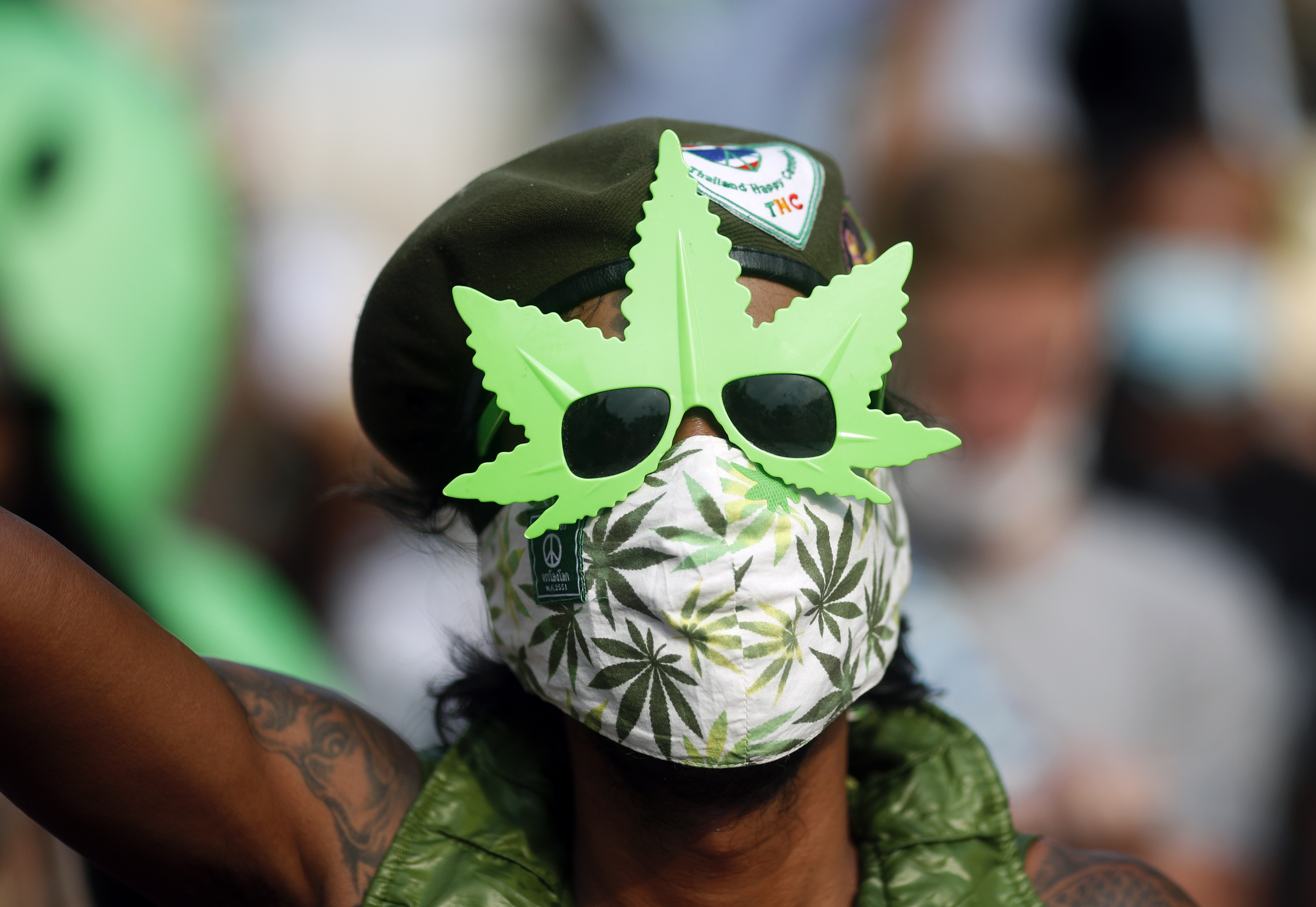 Bangkok (Thailand), 20/04/2022.- A man poses as people take part in a parade to mark the so-called 420 World Cannabis Day in Bangkok, Thailand, 20 April 2022. The annual 420 or 4/20 is known in cannabis culture as Cannabis Day or Weed Day and marked by cannabis smokers around the world on 20 April. Thailand in 2018 became the first nation to legalize cannabis for medical use in Southeast Asia, a region with some of the world's harshest drugs laws. Thai authorities went a step further by removing cannabis and hemp from the country's list of narcotics, a historic move that ended decades of prohibition, allowing people to grow the plant for personal consumption that has been used in traditional medicine and cuisine from 09 June 2022 but remains banned for recreational use. (Tailandia) EFE/EPA/RUNGROJ YONGRIT
