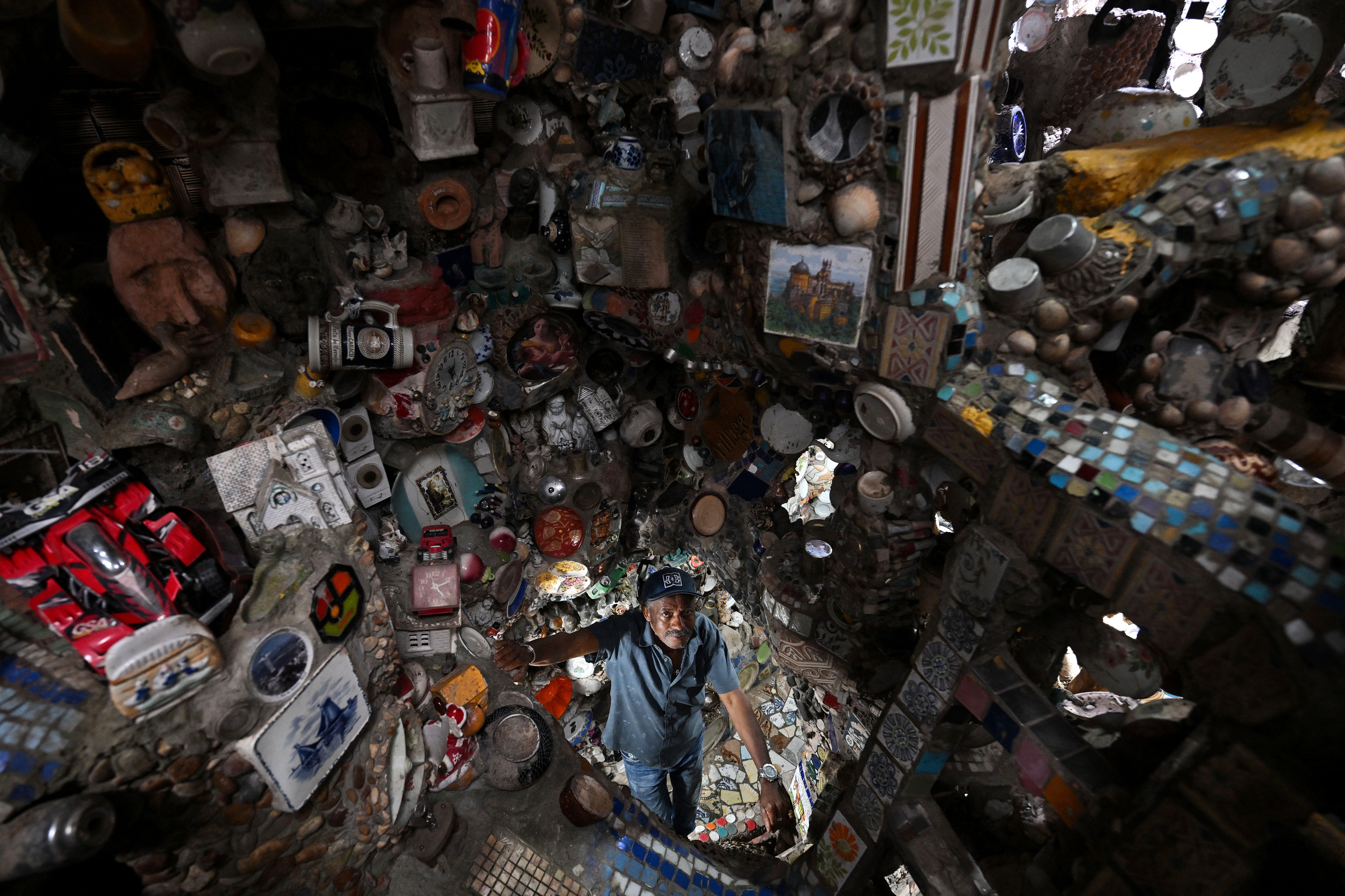 Brazilian artist Estevao Silva da Conceicao poses for a picture at his house in the Paraisopolis favela in Sao Paulo, Brazil, on October 11, 2024.