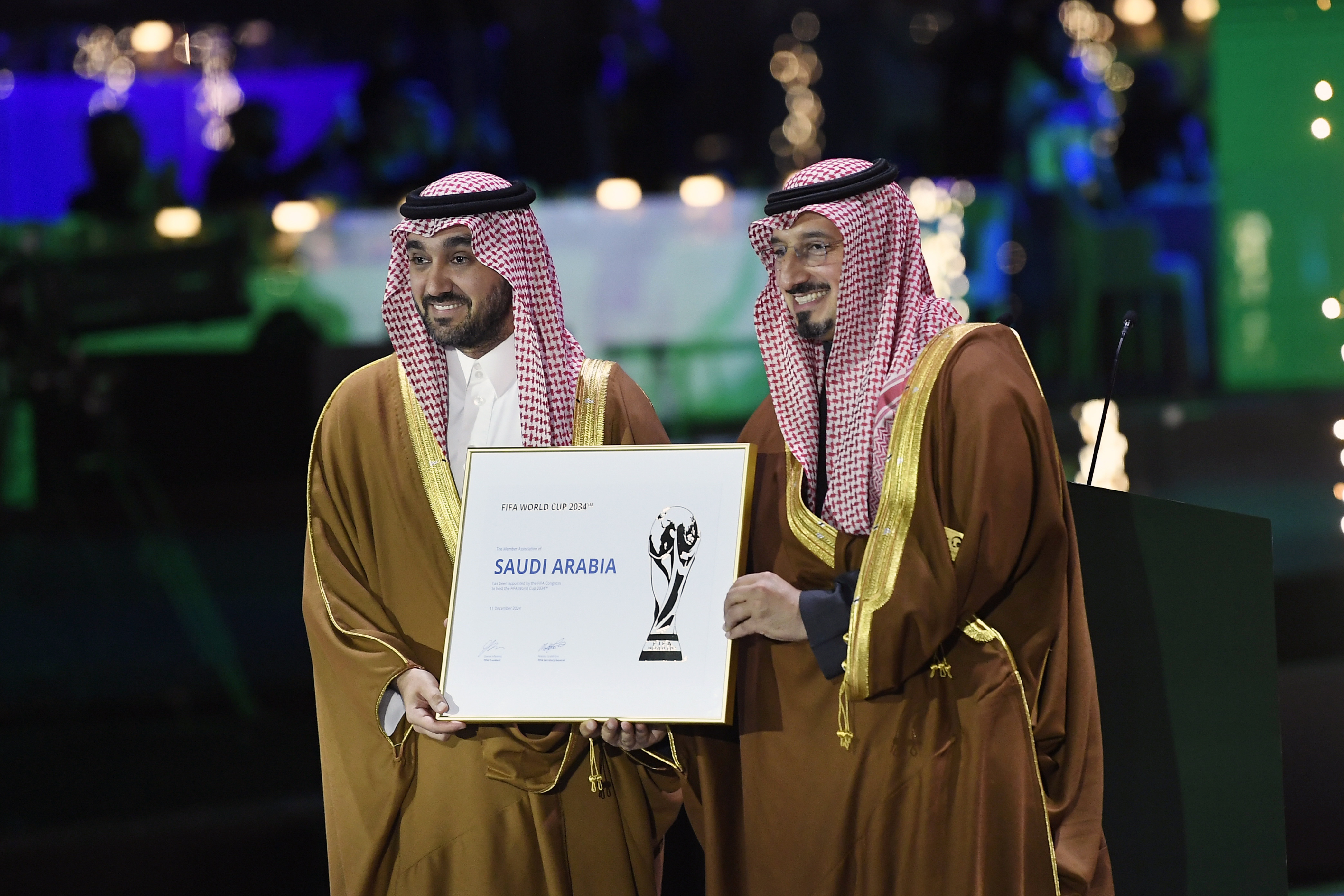Riyadh (Saudi Arabia), 11/12/2024.- Saudi Arabia's Minister of Sports and Youth Abdulaziz bin Turki al-Faisal al-Saud (L) and President of the Saudi Football Federation Yasser Al Misehal pose for a photo after Saudi Arabia was confirmed as host of the 2034 World Cup, in Riyadh, Saudi Arabia, 11 December 2024. The Extraordinary FIFA Congress 2024 on 11 December officially named Saudi Arabia as the host nation of the FIFA World Cup 2034. (Mundial de Fútbol, Arabia Saudita) EFE/EPA/STRINGER