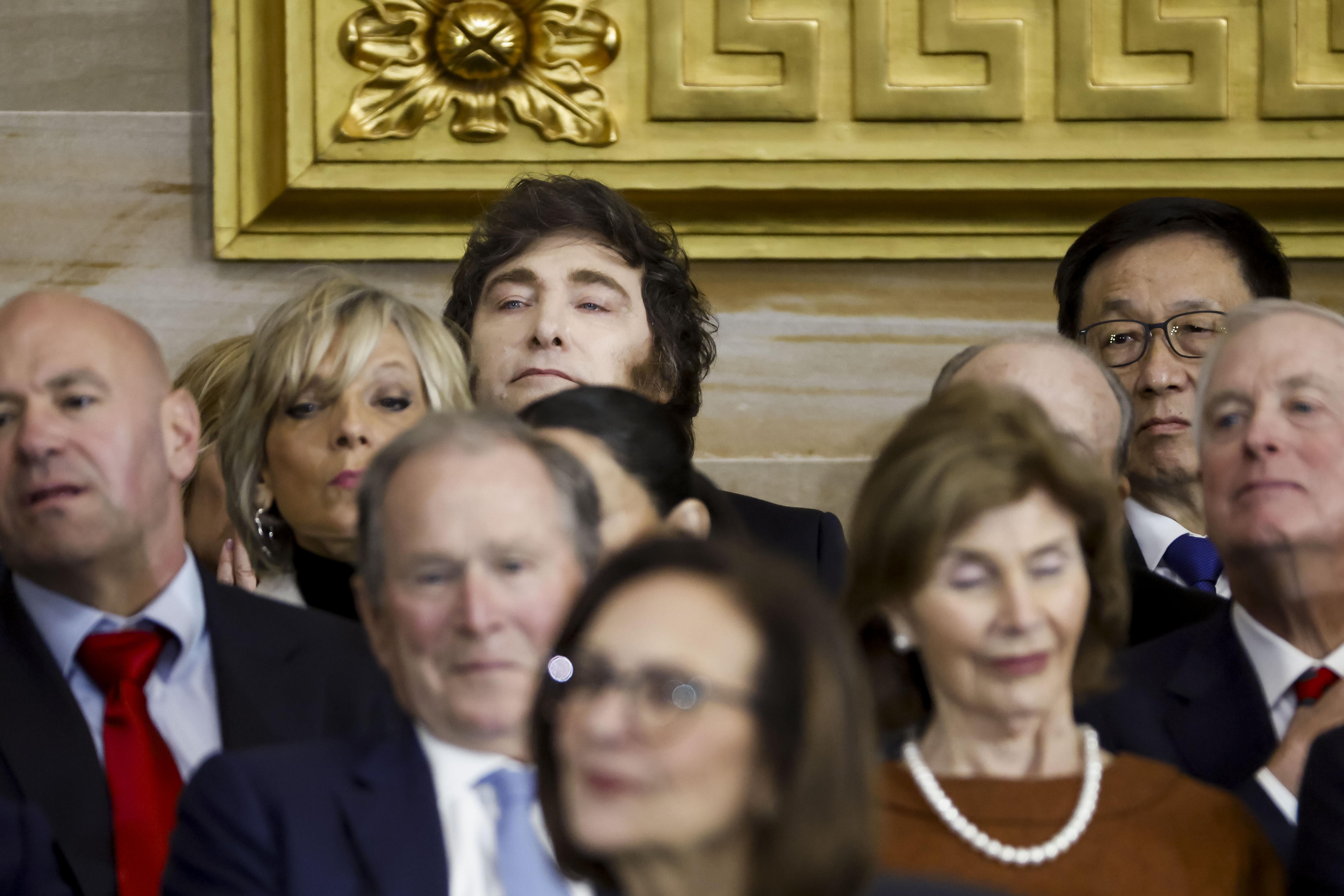 Washington (United States), 20/01/2025.- Argentina'Äôs President Javier Milei (3-L) listens during US President Donald Trump'Äôs inauguration as the 47th President of the United States during a ceremony in the rotunda of the United States Capitol in Washington, DC, USA, 20 January 2025. Trump, who defeated Kamala Harris, is being sworn in today as the 47th president of the United States. (Estados Unidos) EFE/EPA/SHAWN THEW / POOL