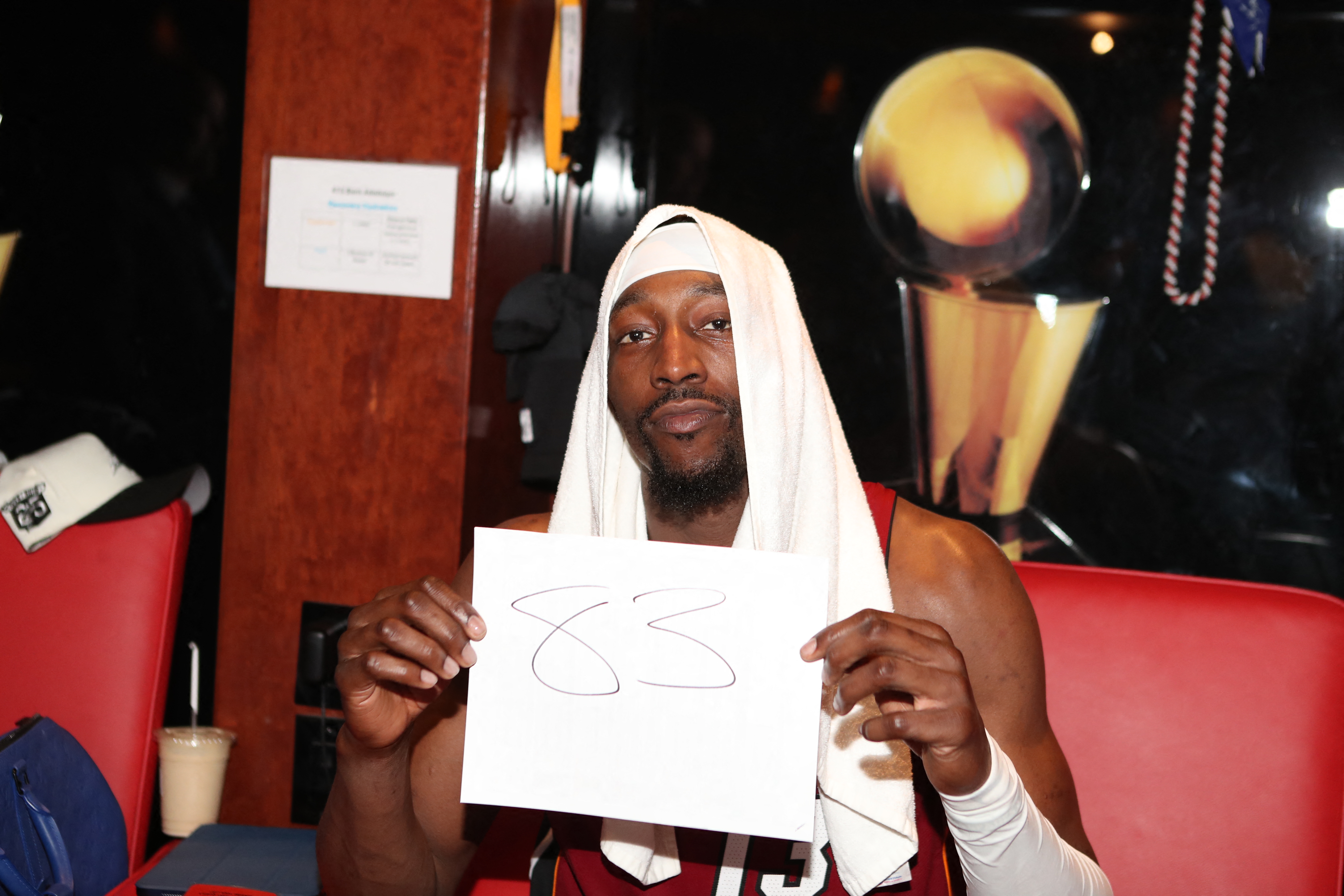 MIAMI, FL - MARCH 10: Bam Adebayo #13 of the Miami Heat poses for a photo holding up a sign after scoring 83 points in game breaking Kobe Bryant's Record of 81 points after the game against the Washington Wizards on March 10, 2026 at Kaseya Center in Miami, Florida. NOTE TO USER: User expressly acknowledges and agrees that, by downloading and or using this Photograph, user is consenting to the terms and conditions of the Getty Images License Agreement. Mandatory Copyright Notice: Copyright 2026 NBAE Issac Baldizon/NBAE via Getty Images/AFP (Photo by Issac Baldizon / NBAE / Getty Images / Getty Images via AFP)