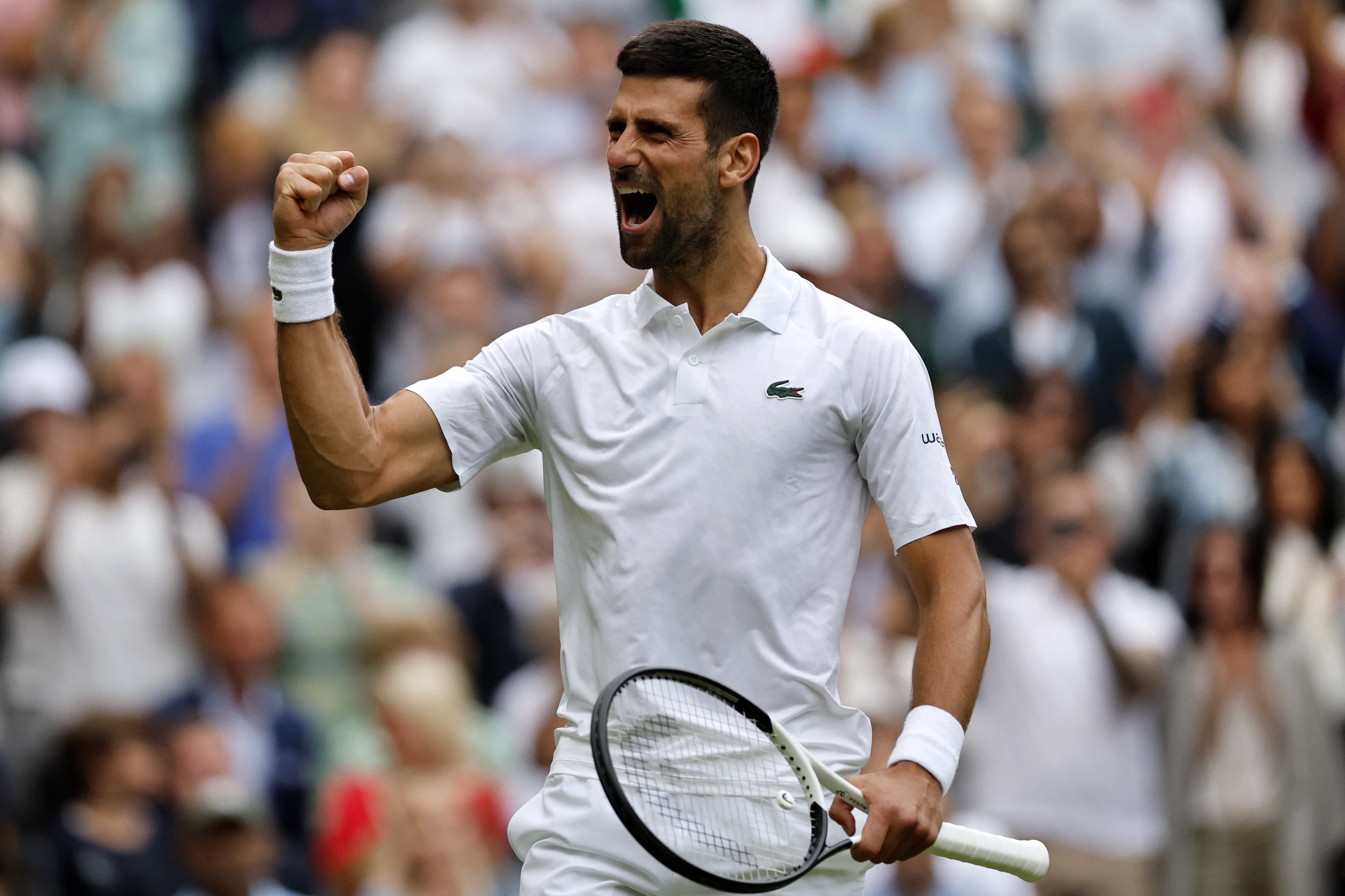 Wimbledon (United Kingdom), 11/07/2023.- Novak Djokovic of Serbia celebrates after winning the match point against Andrey Rublev of Russia during their Men's Singles quarter final match at the Wimbledon Championships, Wimbledon, Britain, 11 July 2023. (Tenis, Rusia, Reino Unido) EFE/EPA/TOLGA AKMEN EDITORIAL USE ONLY