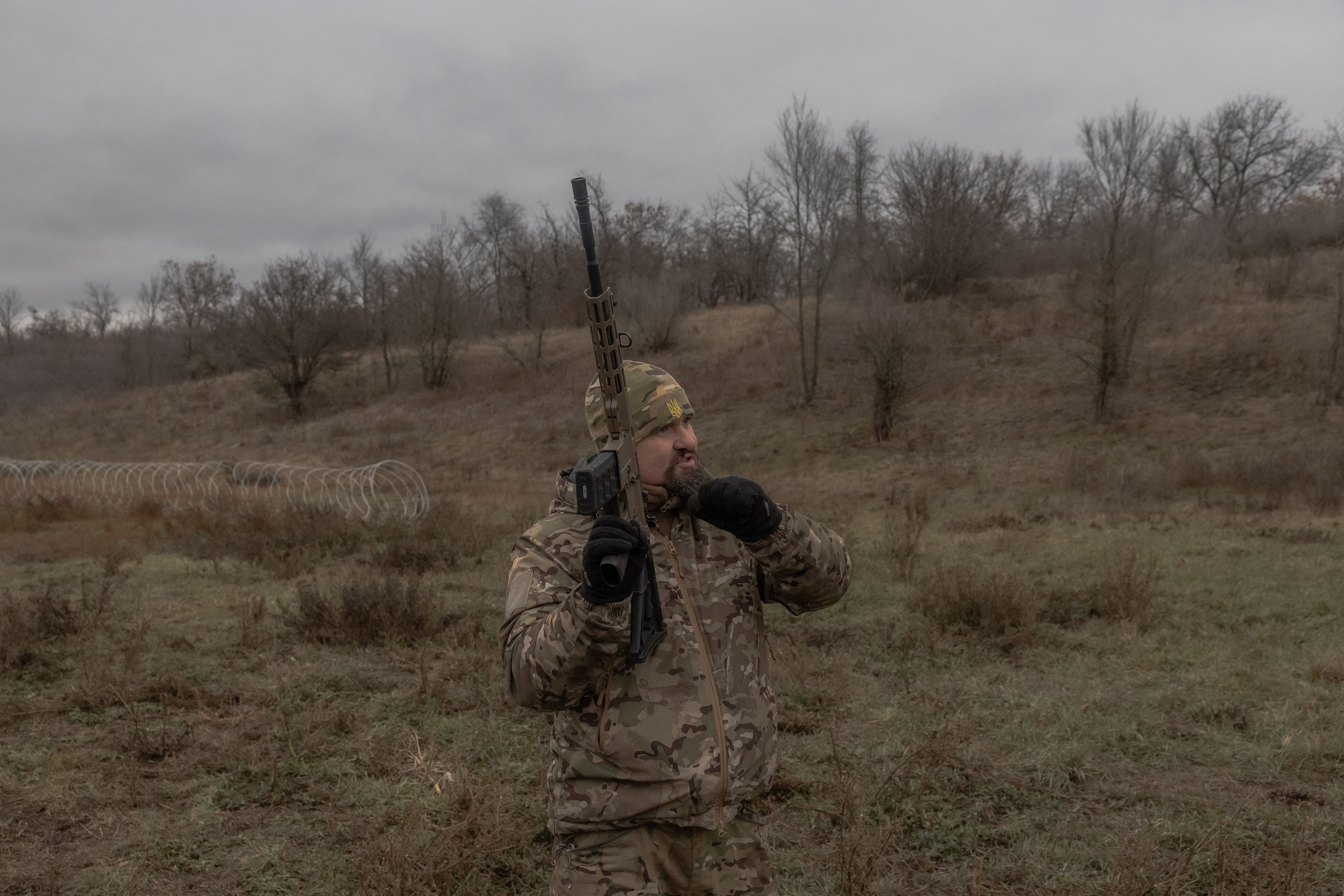 Company commander of the 1st Separate Assault Battalion Da Vinci, Oleksiy (C), addresses Ukrainian soldiers during a training exercise in the Dnipropetrovsk region, on December 12, 2024, amid the Russian invasion of Ukraine.