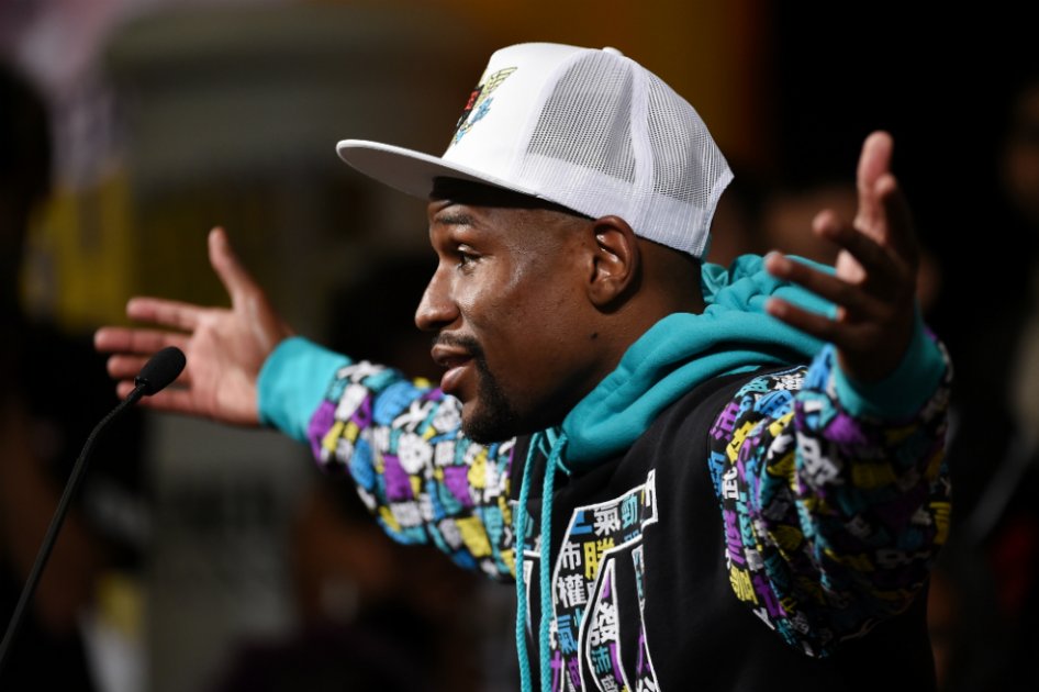 Mayweather retiene títulos del CMB y AMB e iguala récord de 49-0 de Rocky Marciano