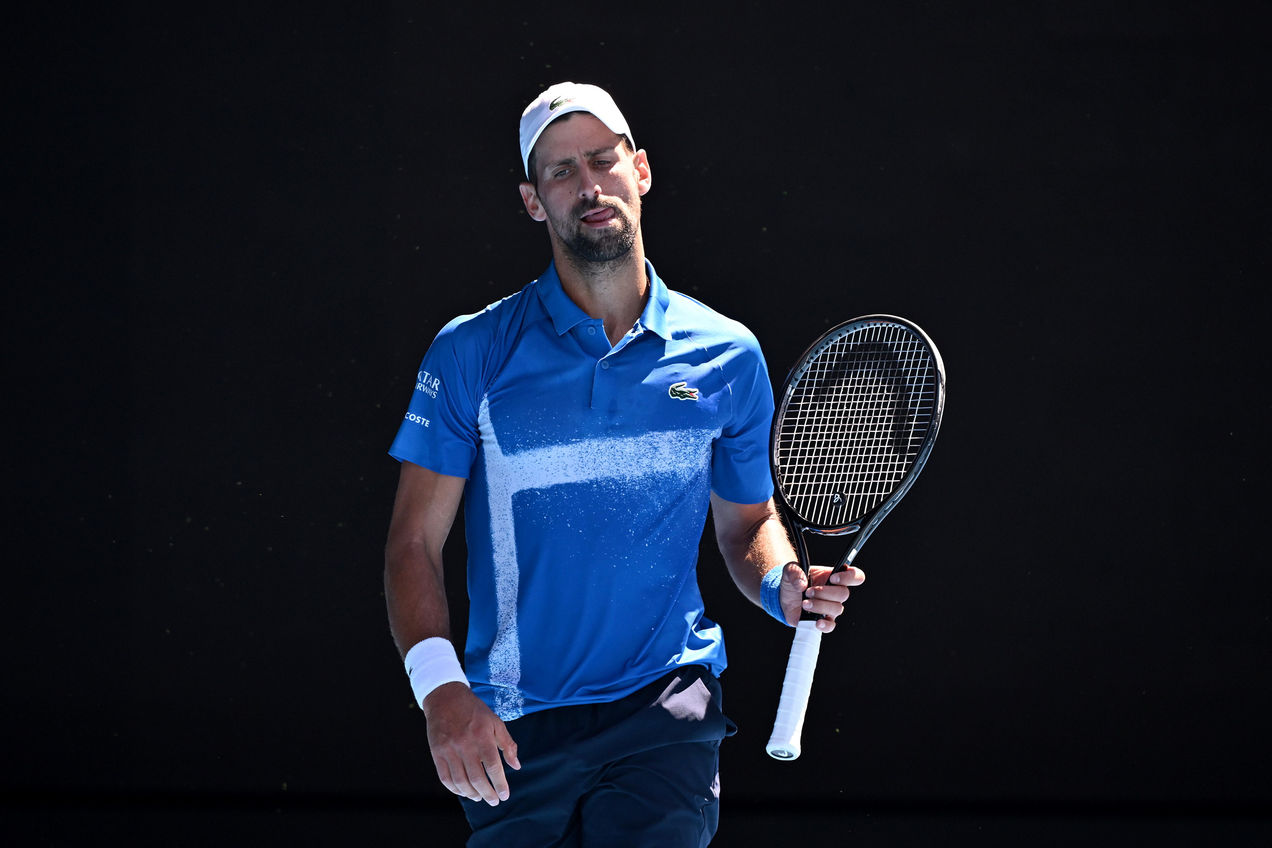 Melbourne (Australia), 24/01/2025.- Novak Djokovic of Serbia reacts during a semifinal match of the Australian Open against Alexander Zverev of Germany at Melbourne Park in Melbourne, Australia 24 January 2025. (Tenis, Alemania) EFE/EPA/JAMES ROSS AUSTRALIA AND NEW ZEALAND OUT