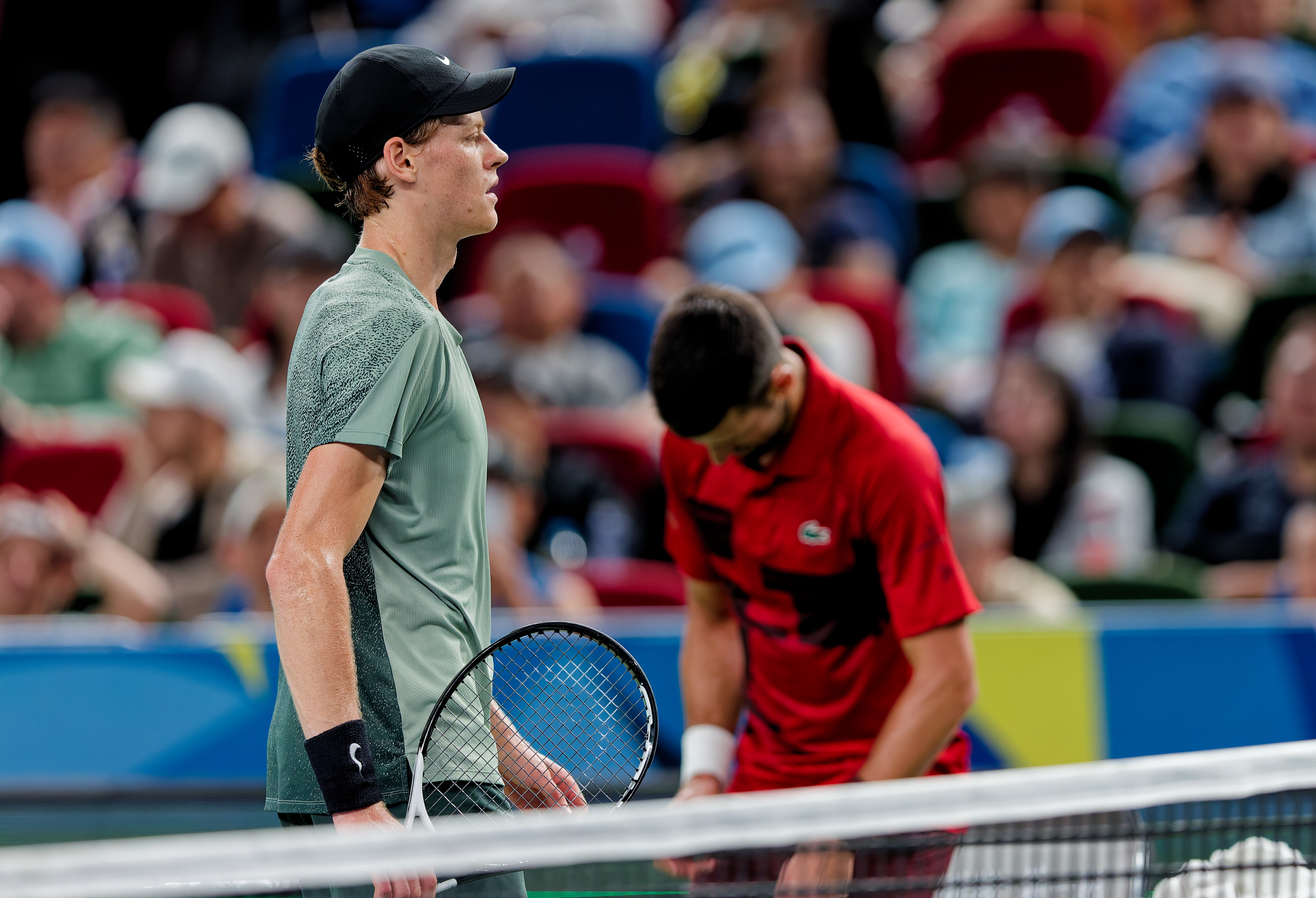 Shanghai (China), 13/10/2024.- Jannik Sinner of Italy (L) reacts during his Men's Singles Final match against Novak Djokovic of Serbia at the Shanghai Masters tennis tournament in Shanghai, China, 13 October 2024. (Tenis, Italia) EFE/EPA/ALEX PLAVEVSKI