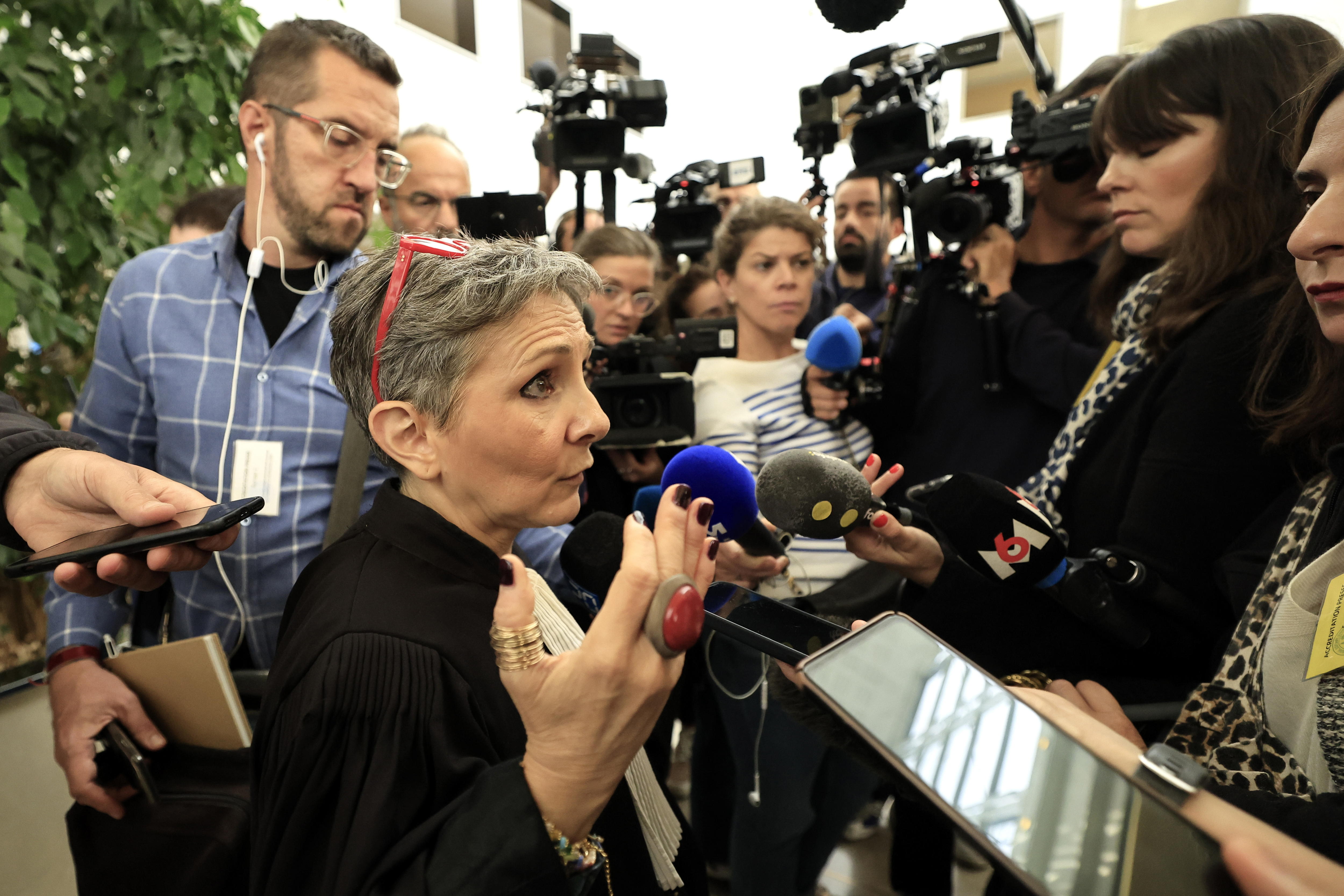 Avignon (France), 16/09/2024.- Dominique Pelicot's lawyer Beatrice Zavarro (2-L) speaks to members of the media at the criminal court in Avignon, southern France, 16 September 2024. Dominique Pelicot, former husband of Gisele Pelicot, is accused of drugging his wife to rape her while she was unconscious and having offered her to dozens of men at their house in Mazan, south of France, between 2011 and 2020. Fifty other men are also on trial for their alleged involvement. Dominique Pelicot could spend up to 20 years behind bars if proven guilty. Main defendant Dominique Pelicot's health issues could lead to a postponement of the trial. (Francia) EFE/EPA/GUILLAUME HORCAJUELO