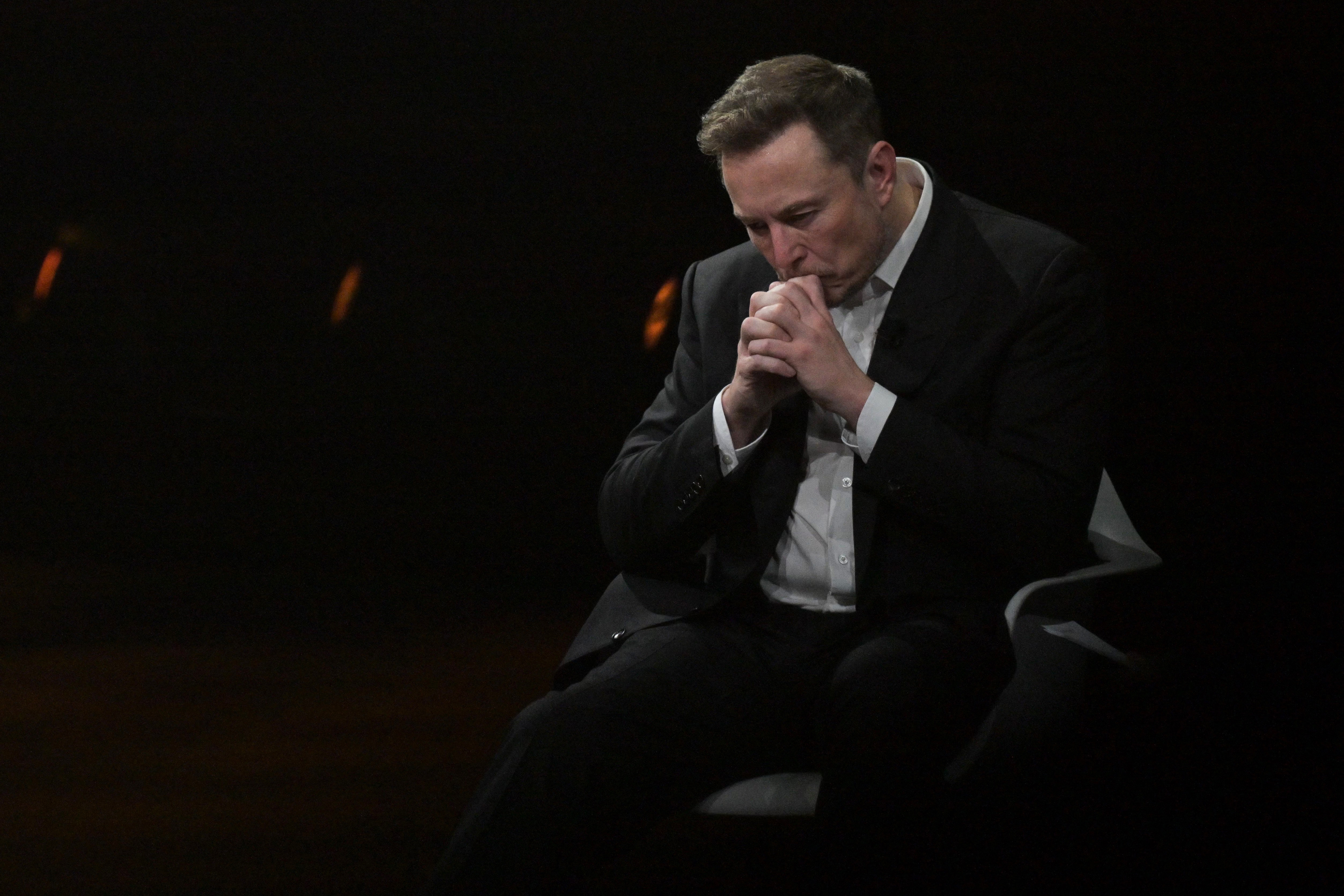 (FILES) SpaceX, Twitter and electric car maker Tesla CEO Elon Musk reacts as he visits the Vivatech technology startups and innovation fair at the Porte de Versailles exhibition center in Paris, on June 16, 2023.