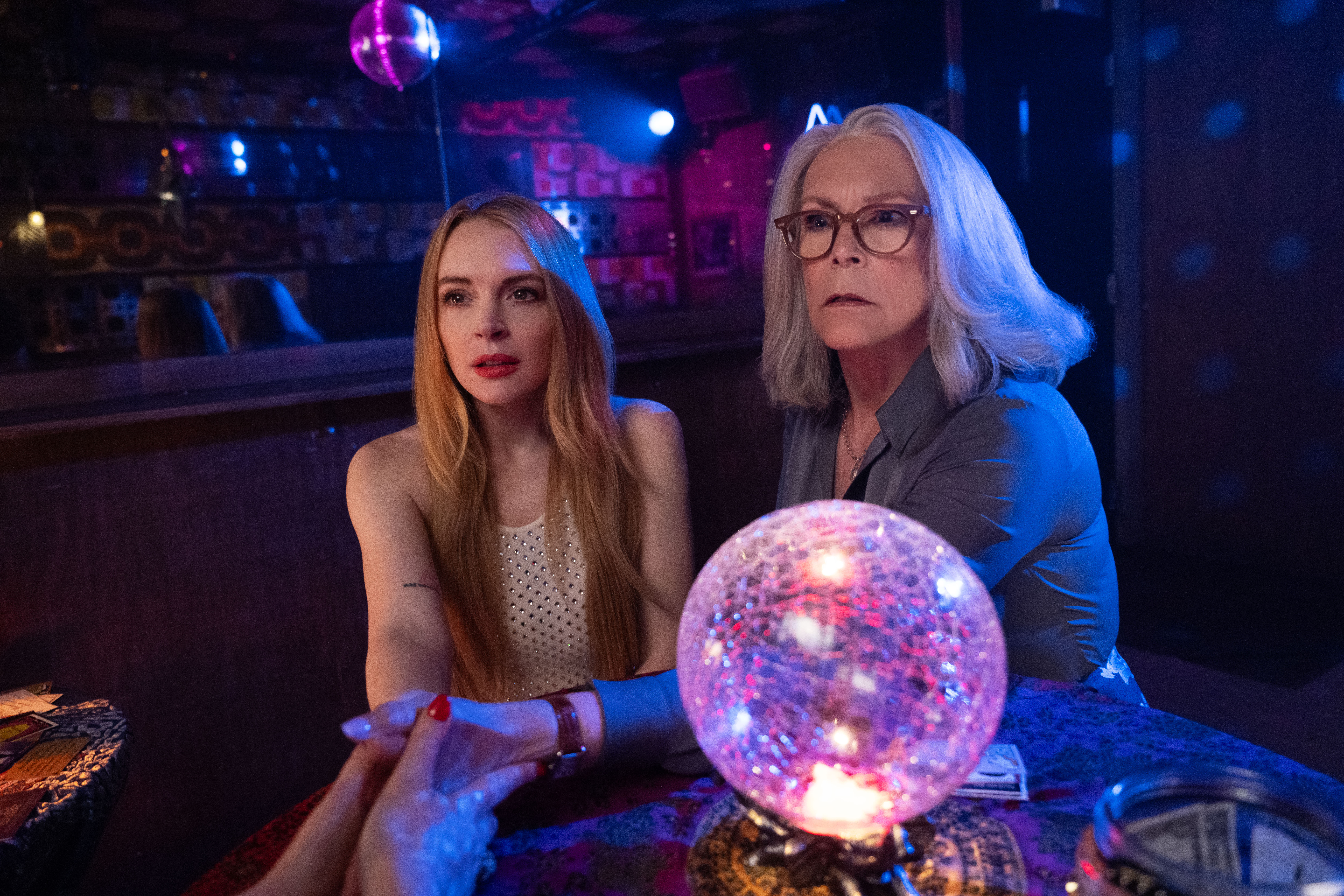 (L-R) Lindsay Lohan as Anna Coleman and Jamie Lee Curtis as Tess Coleman in Disney's FREAKIER FRIDAY. Photo by Glen Wilson. © 2025 Disney Enterprises, Inc. All Rights Reserved.
