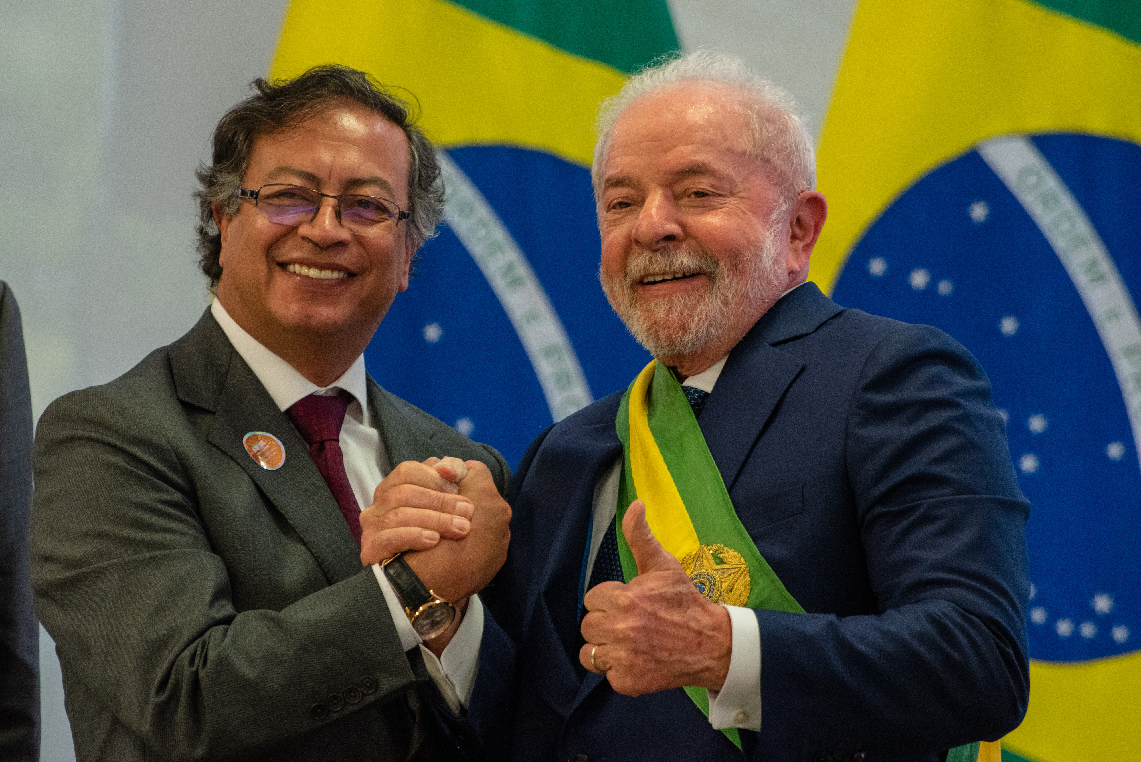Gustavo Petro shakes Luiz Inacio Lula da Silvas hand after the Brazilian presidents January 2023 inauguration.