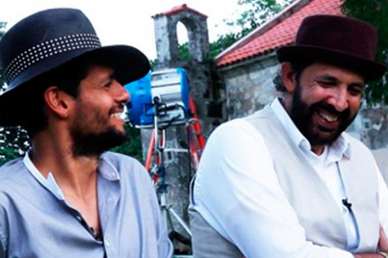 Draco y Juan Luis Guerra en el video de "Esto es Vida".