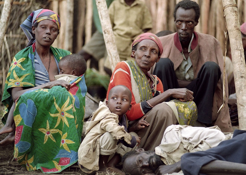 (FILES) In this file photo taken on May 28, 1994 displaced Tutsis rest at a refugee camp in Kabgayi. - On April 7, 2019, Rwanda will commemorate the 25th anniversary of the 1994 genocide. (Photo by ALEXANDER JOE / AFP)