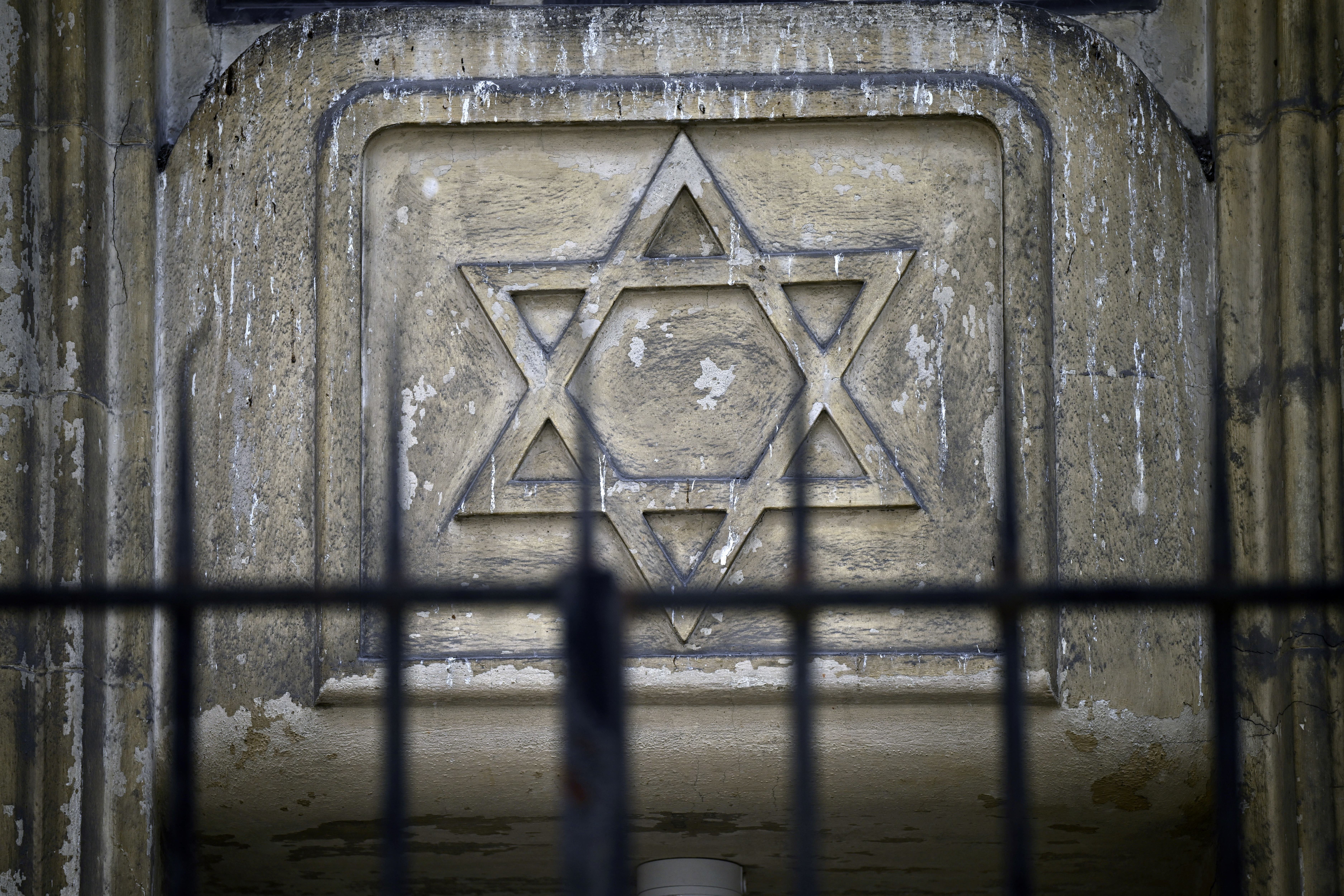 (FILES) A photograph taken on October 9, 2023 shows a star of David on the facade of a synagogue in central Paris, two days after security measures have been reinforced near Jewish temples and schools.