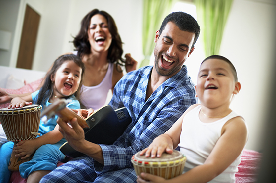 Family Playing Music Together --- Image by © Tim Pannell/Corbis