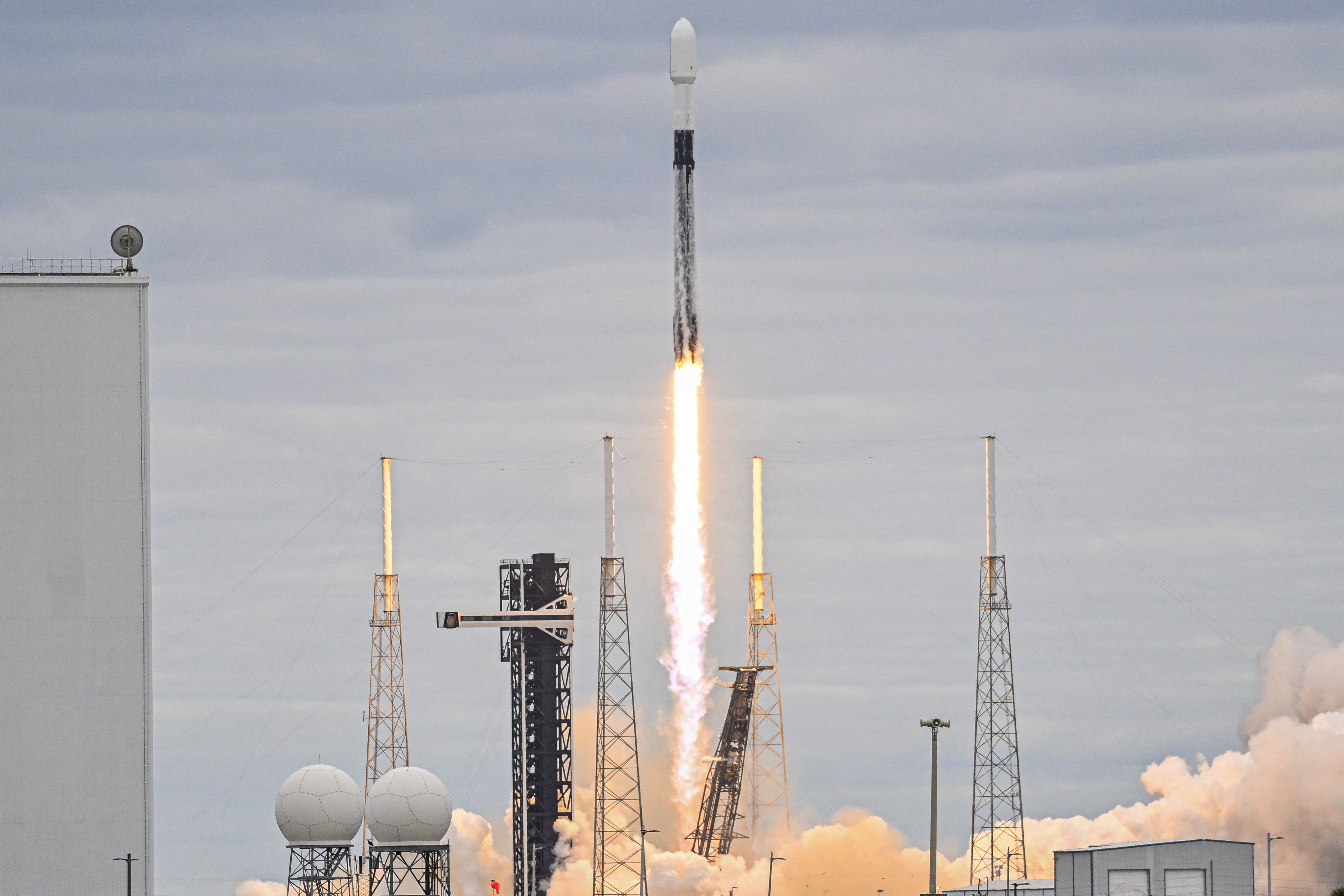 A SpaceX Falcon 9 rocket with the GSAT-20 satellite aboard launches from Launch Complex 40 at NASA Kennedy Space Center in Cape Canaveral on November 18, 2024 (Photo by Miguel J. Rodriguez Carrillo / AFP)