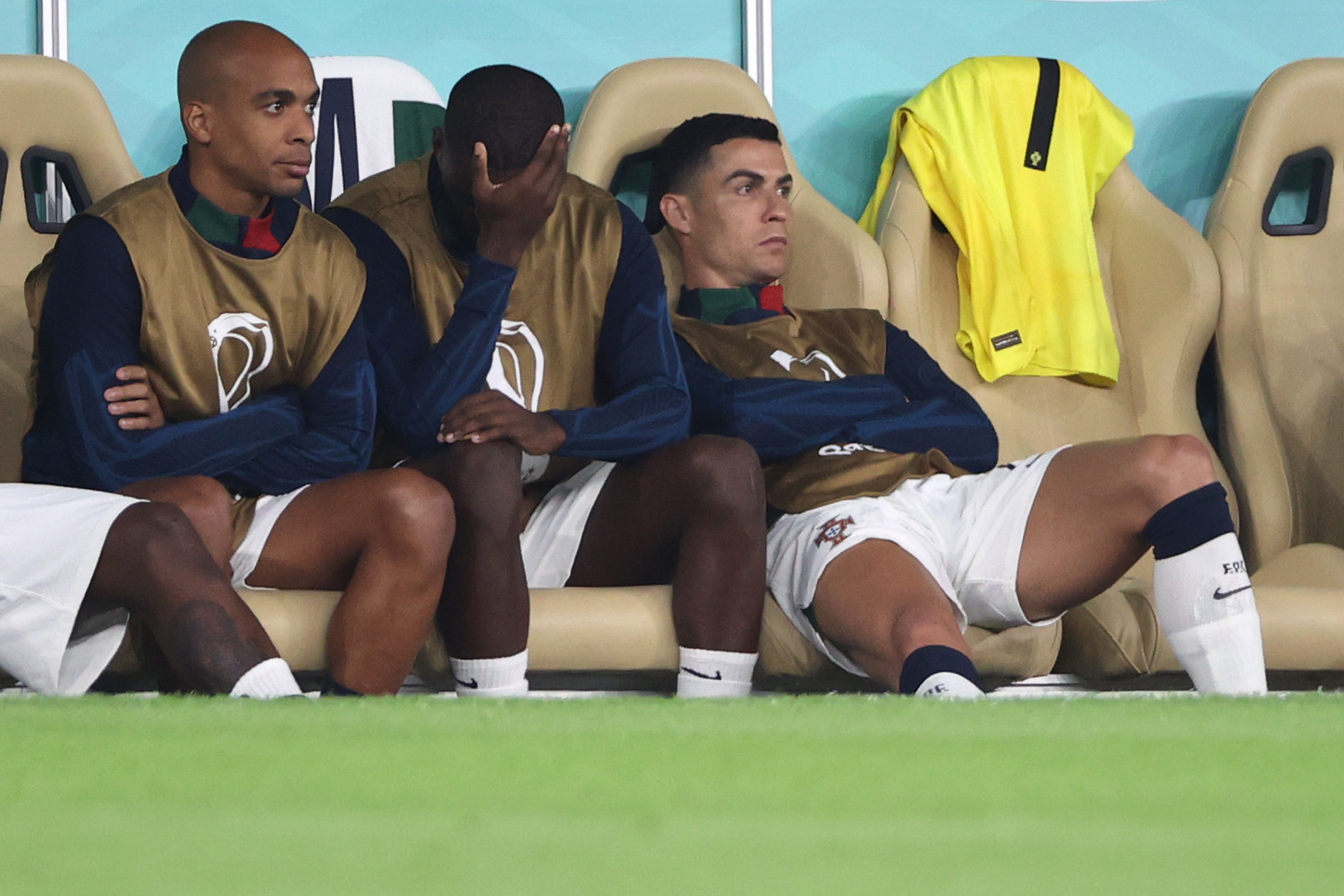 Doha (Qatar), 10/12/2022.- Cristiano Ronaldo (R) of Portugal sits on the bench during the FIFA World Cup 2022 quarter final soccer match between Morocco and Portugal at Al Thumama Stadium in Doha, Qatar, 10 December 2022. (Mundial de Fútbol, Marruecos, Catar) EFE/EPA/Ali Haider
