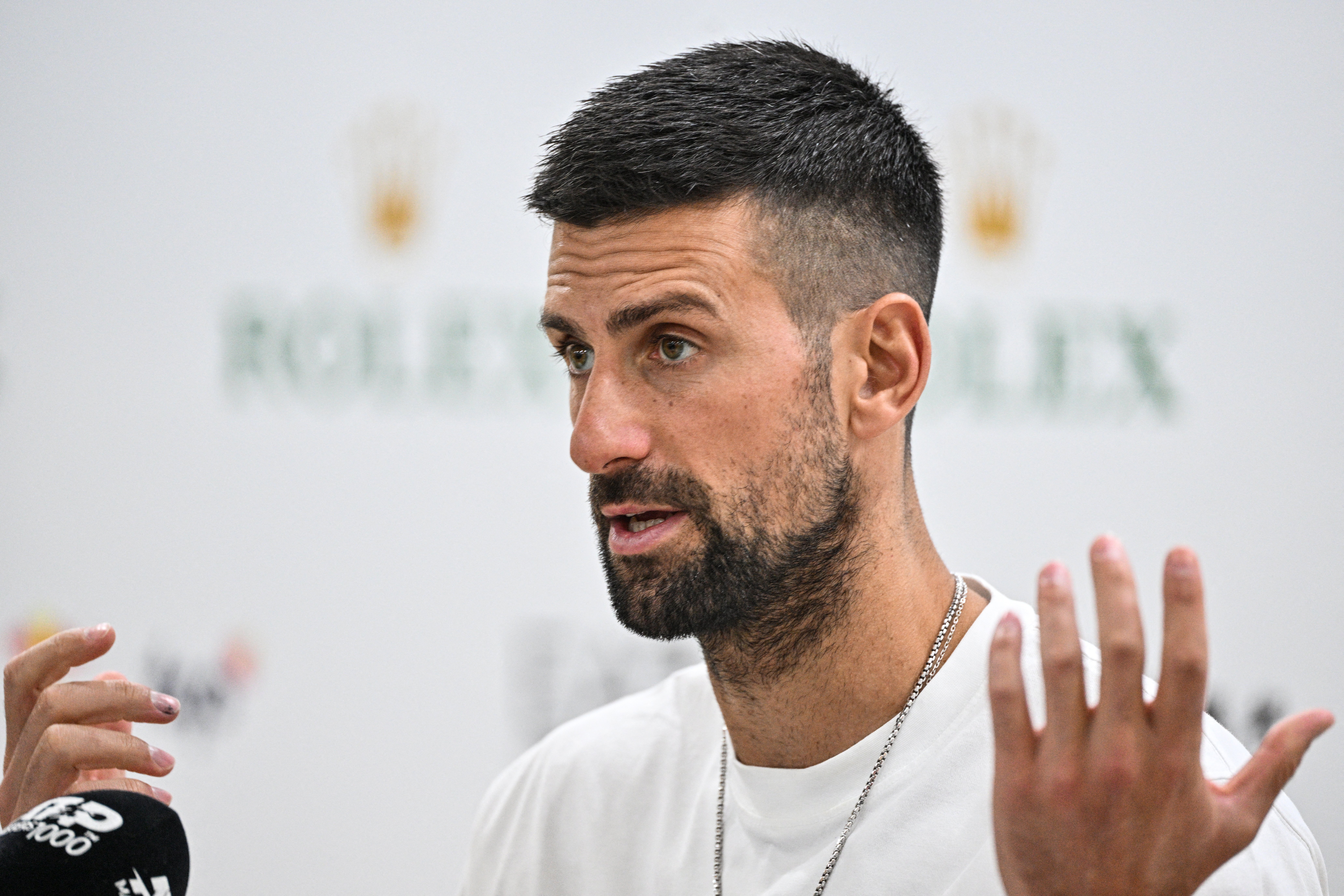 Serbia's Novak Djokovic attends a press conference at the Shanghai Masters tennis tournament in Shanghai on October 2, 2024. (Photo by Hector RETAMAL / AFP)