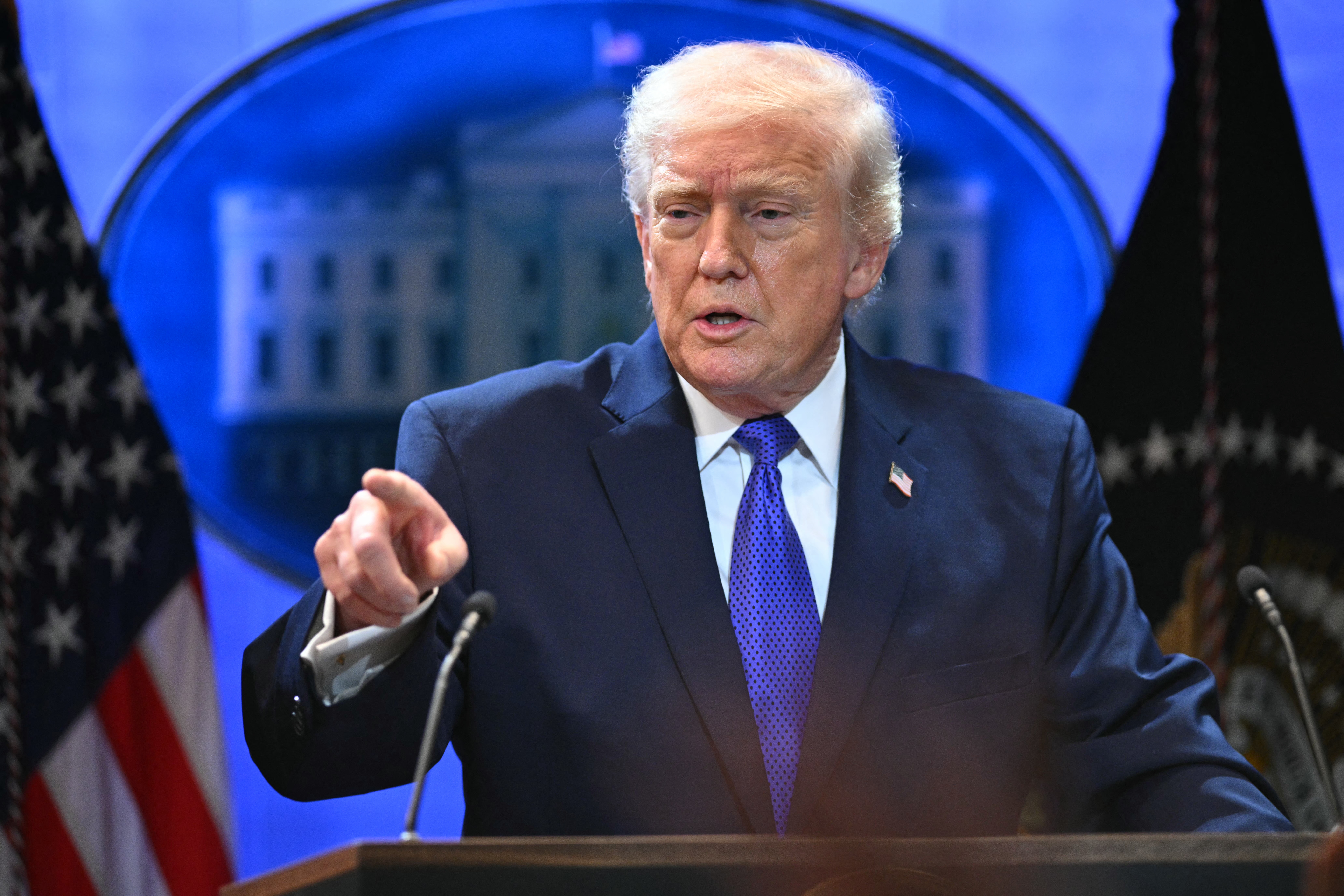 US President Donald Trump takes question from reporters during a press conference in the Brady Press Briefing Room of the White House in Washington, DC, on February 20, 2026. US President Donald Trump will hold a press conference Friday to discuss the Supreme Court's ruling against a major part of his tariffs, spokeswoman Karoline Leavitt said. (Photo by Mandel NGAN / AFP)