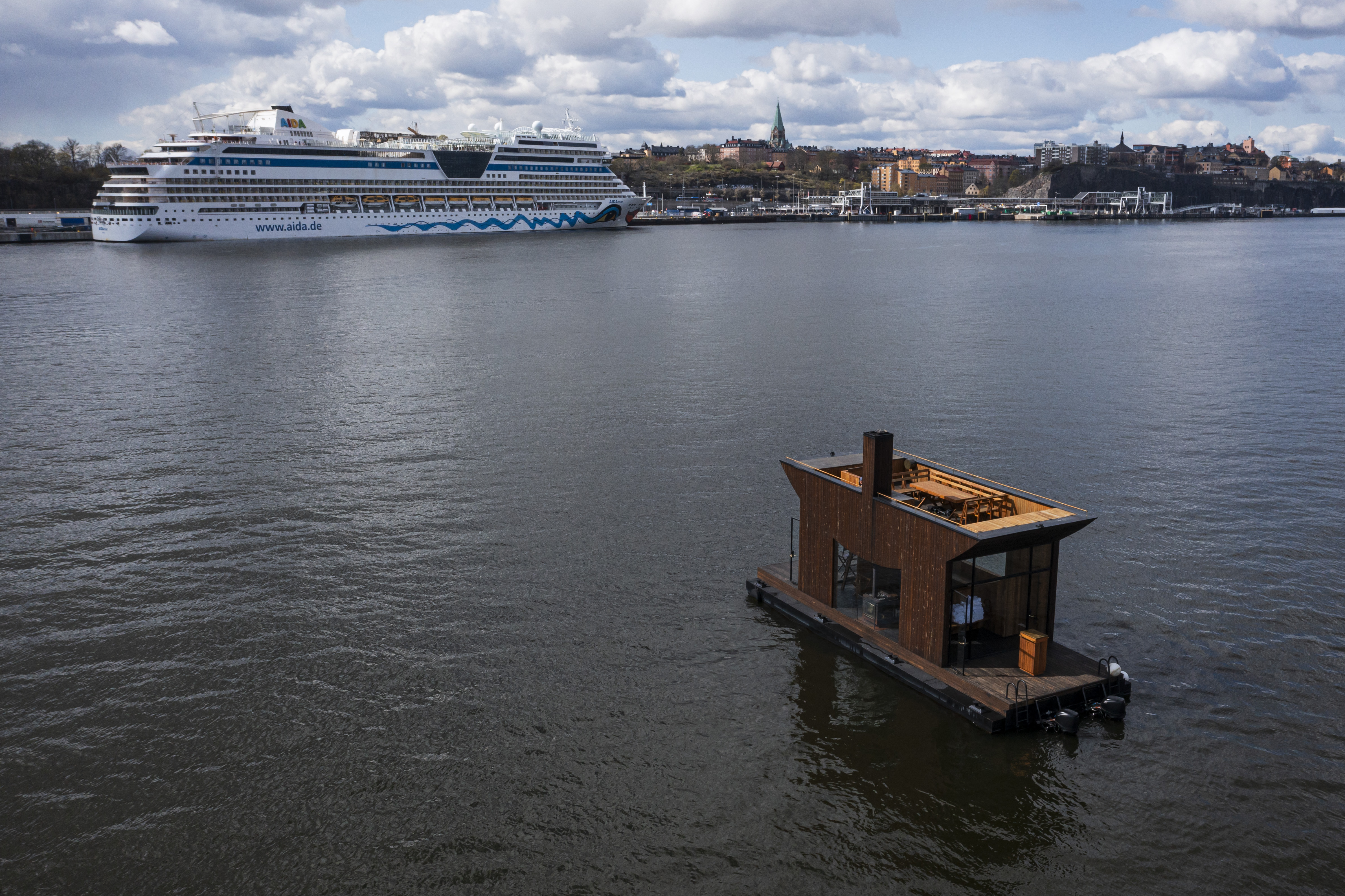 This aerial image taken on May 5, 2023 shows the "Big Branzino", a luxe floating sauna measuring 30 square metres, as it floats in the waters of the Swedish capital, Stockholm.