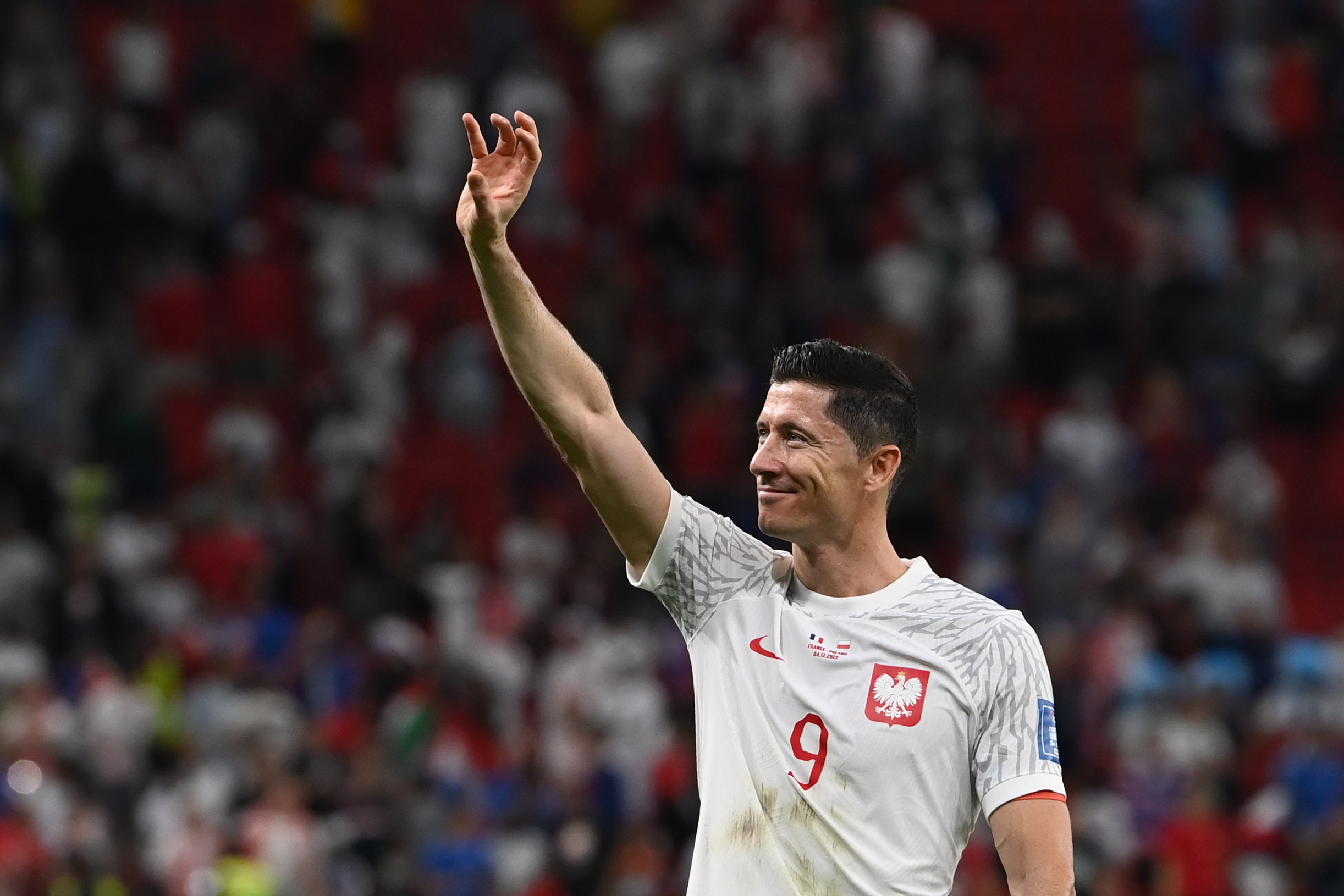 Doha (Qatar), 04/12/2022.- Robert Lewandowski of Poland greets spectators after the FIFA World Cup 2022 round of 16 soccer match between France and Poland at Al Thumama Stadium in Doha, Qatar, 04 December 2022. (Mundial de Fútbol, Francia, Polonia, Catar) EFE/EPA/Georgi Licovski