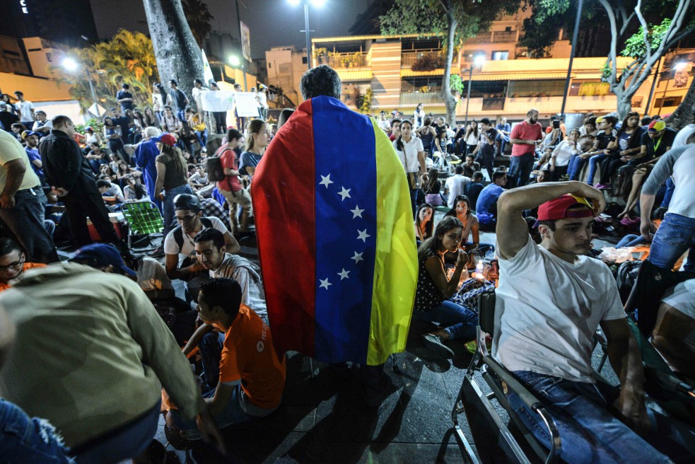 Legisladores piden estatus migratorio para miles de venezolanos que han salido del país por culpa de la crisis. / AFP