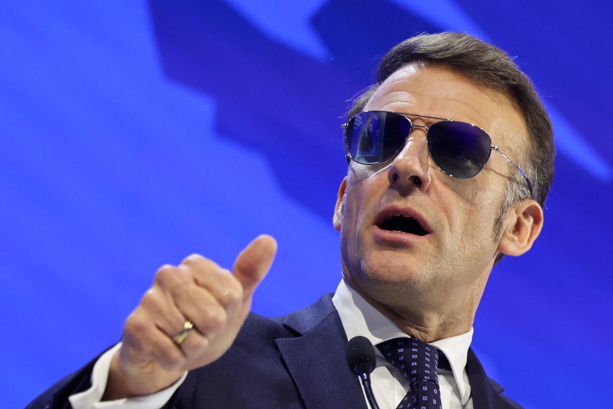 France's President Emmanuel Macron gestures as he delivers a speech during the World Economic Forum (WEF) annual meeting in Davos on January 20, 2026.