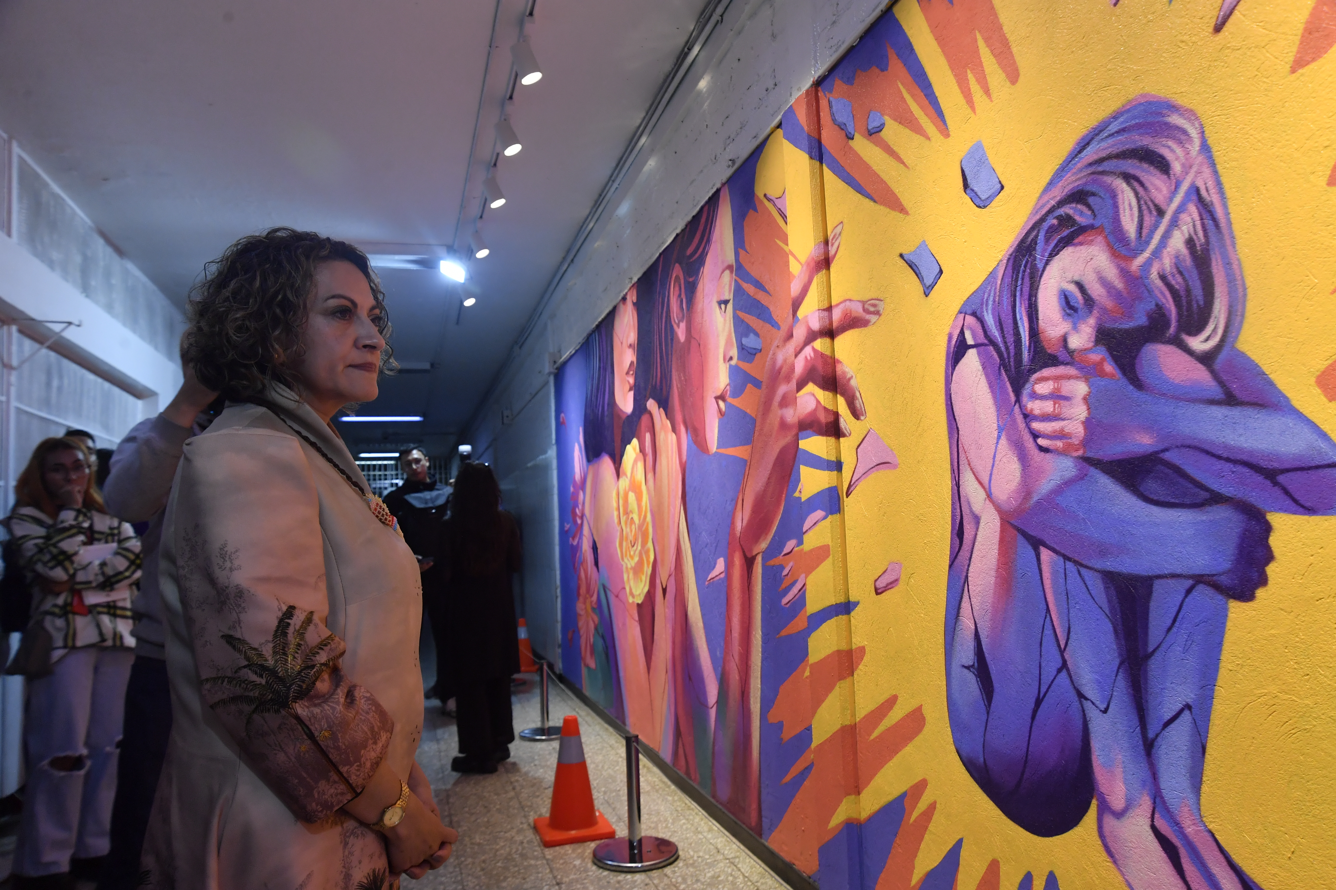 Periodista y activista, regresó a la cárcel La Modelo para recibir el mural "Fragmentos que Florecen", como reparación simbólica por los hechos de violencia que tuvo que vivir hace 24 años.
