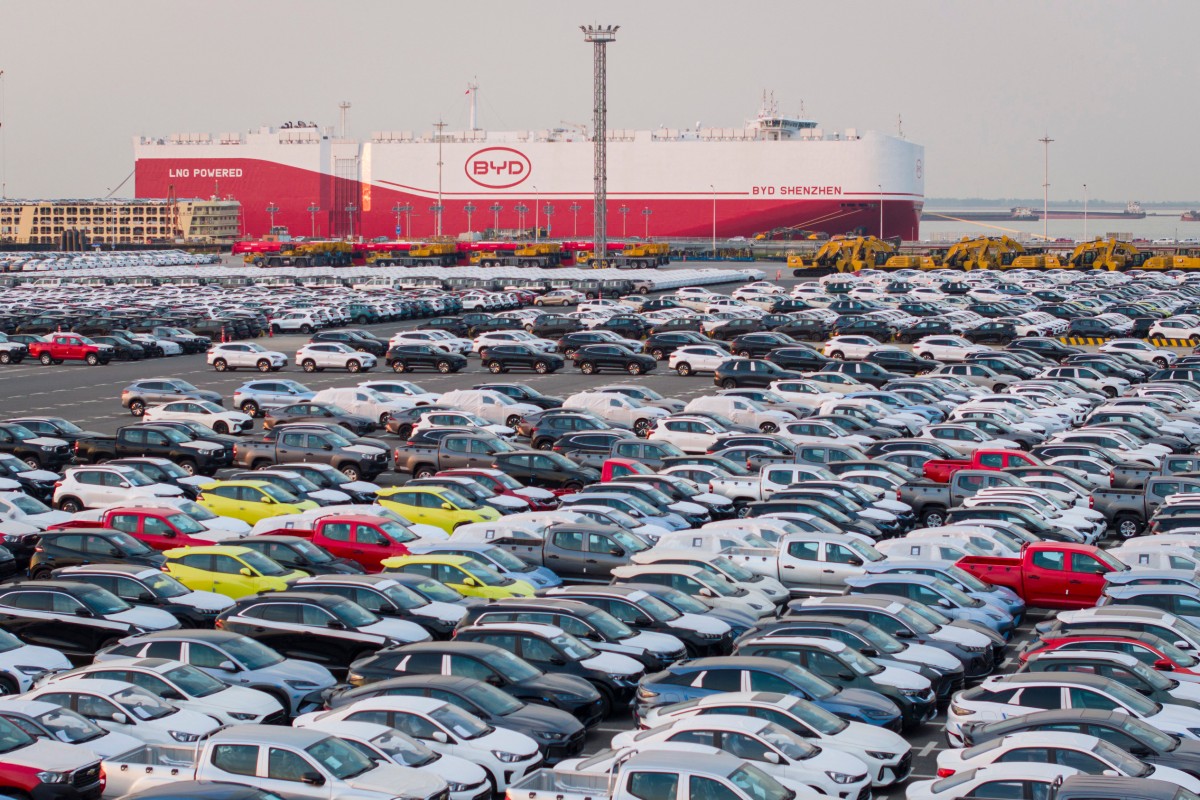 (FILES) This photo taken on April 27, 2025 shows BYD electric cars waiting to be loaded to the automobile carrier BYD "Shenzhen", which will sail to Brazil from the Taicang Port in Suzhou, in China’s eastern Jiangsu province.